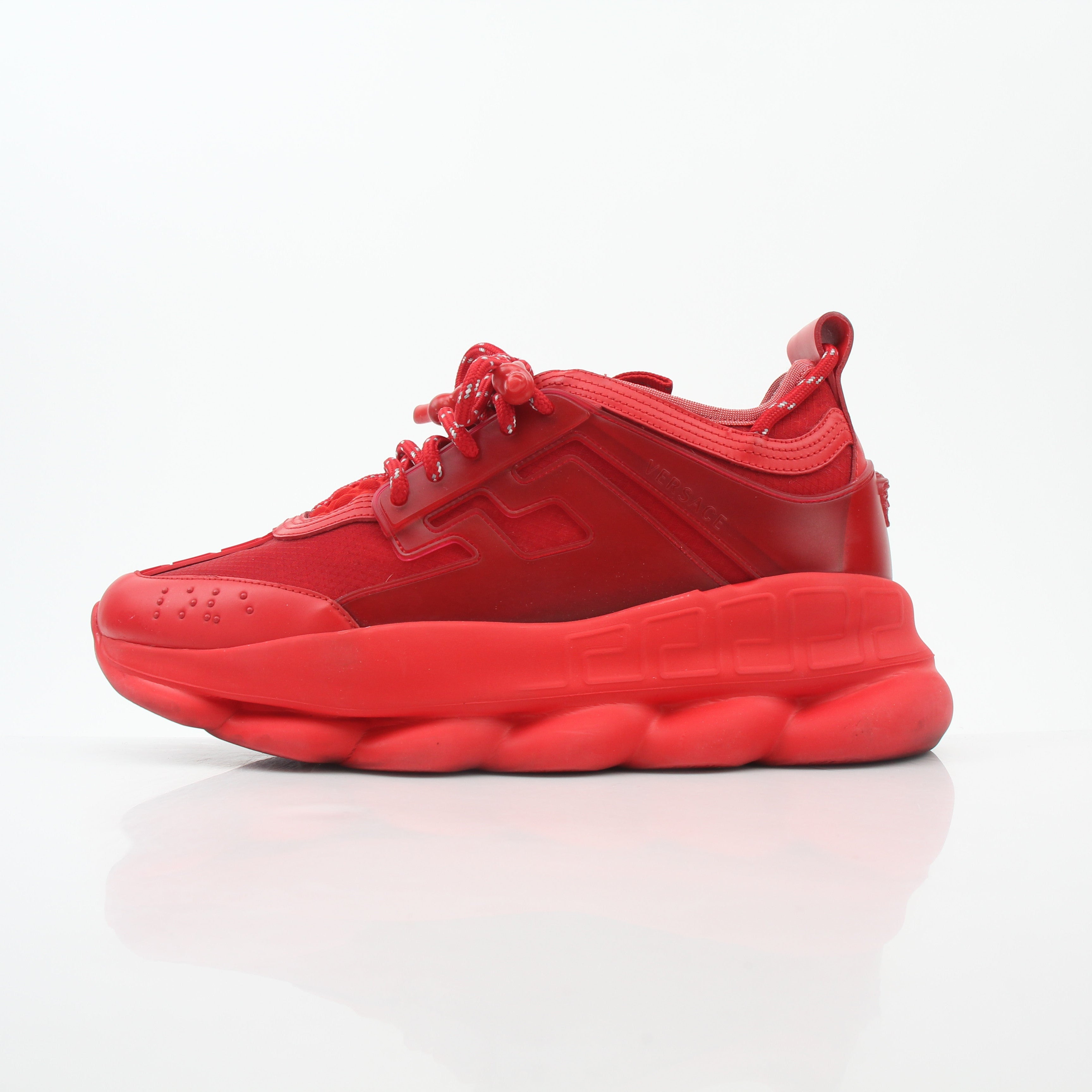 Gold & Beyond Versace Red Chain Reaction 2 Chainz sneakers, stylish shoes with bold red and chain design, displayed on a plain background.