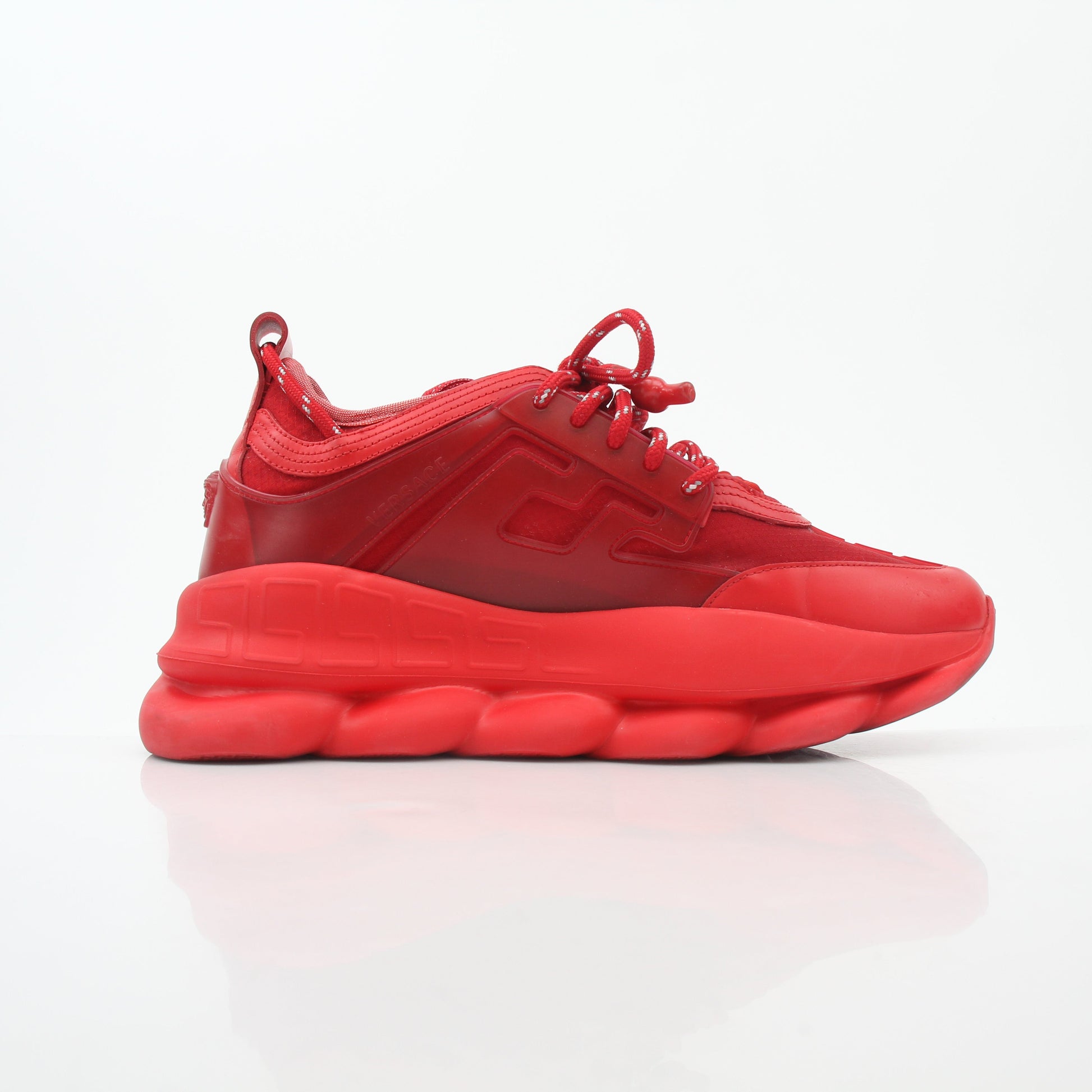 Gold & Beyond Versace Red Chain Reaction 2 Chainz sneakers showing red and white design with chain accents and sporty shoe details.