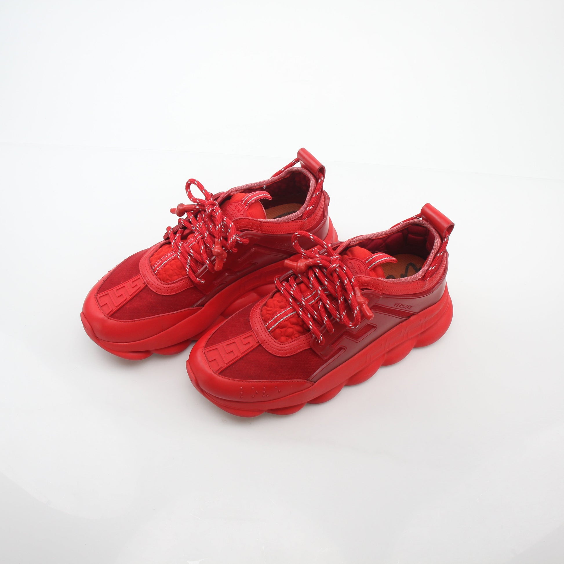 Gold & Beyond Versace Red Chain Reaction 2 Chainz sneakers with bold red design and stylish chain accents, casual shoe for men.