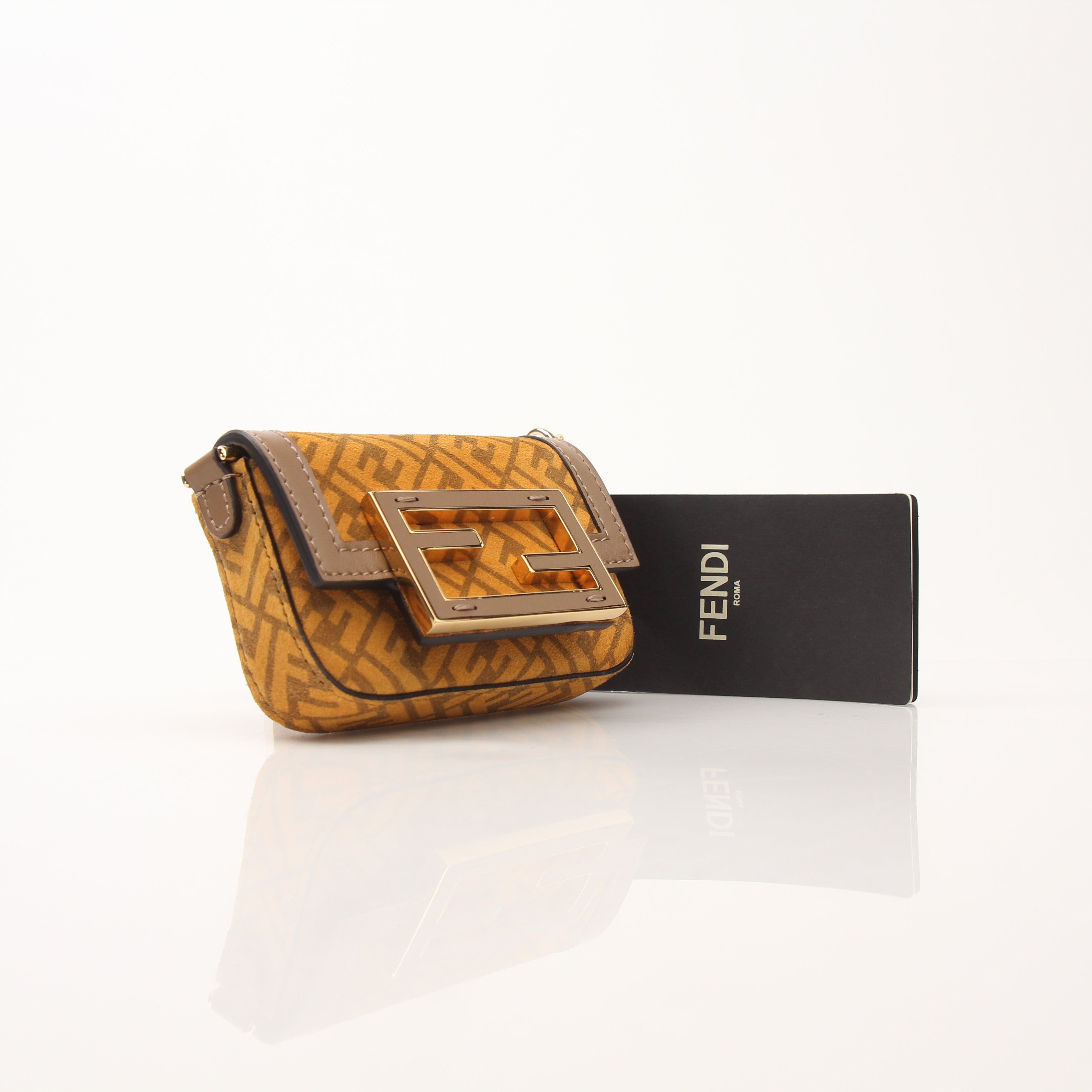 Fendi Chain Baguette Charm Bag Zucca Suede Nano by Gold & Beyond, showcasing the handbag with chain detail and Zucca pattern.