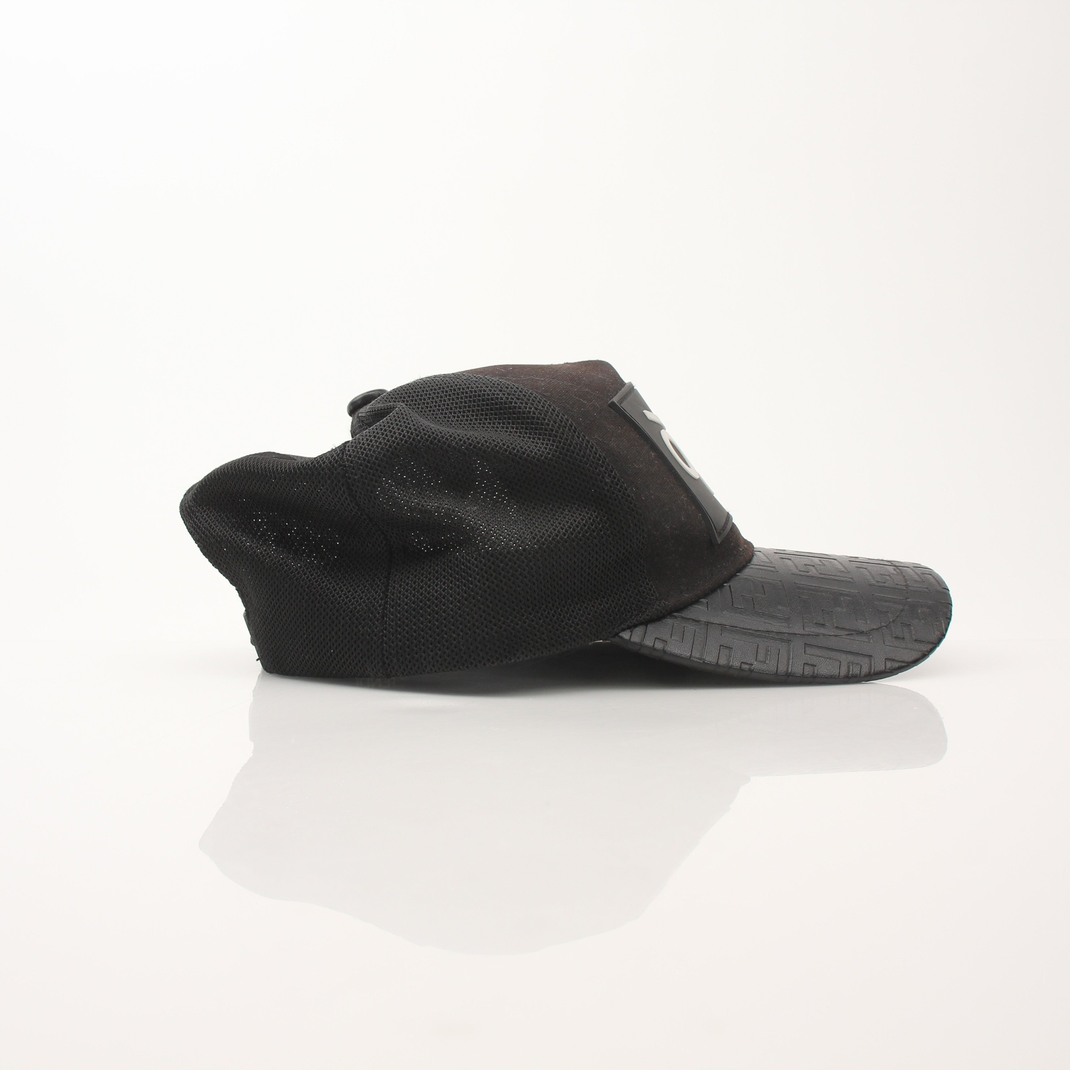 Fendi FF leather Bad Bugs robot trucker hat with adjustable strap, gold accents, and embroidered logo, styled as trendy accessories.