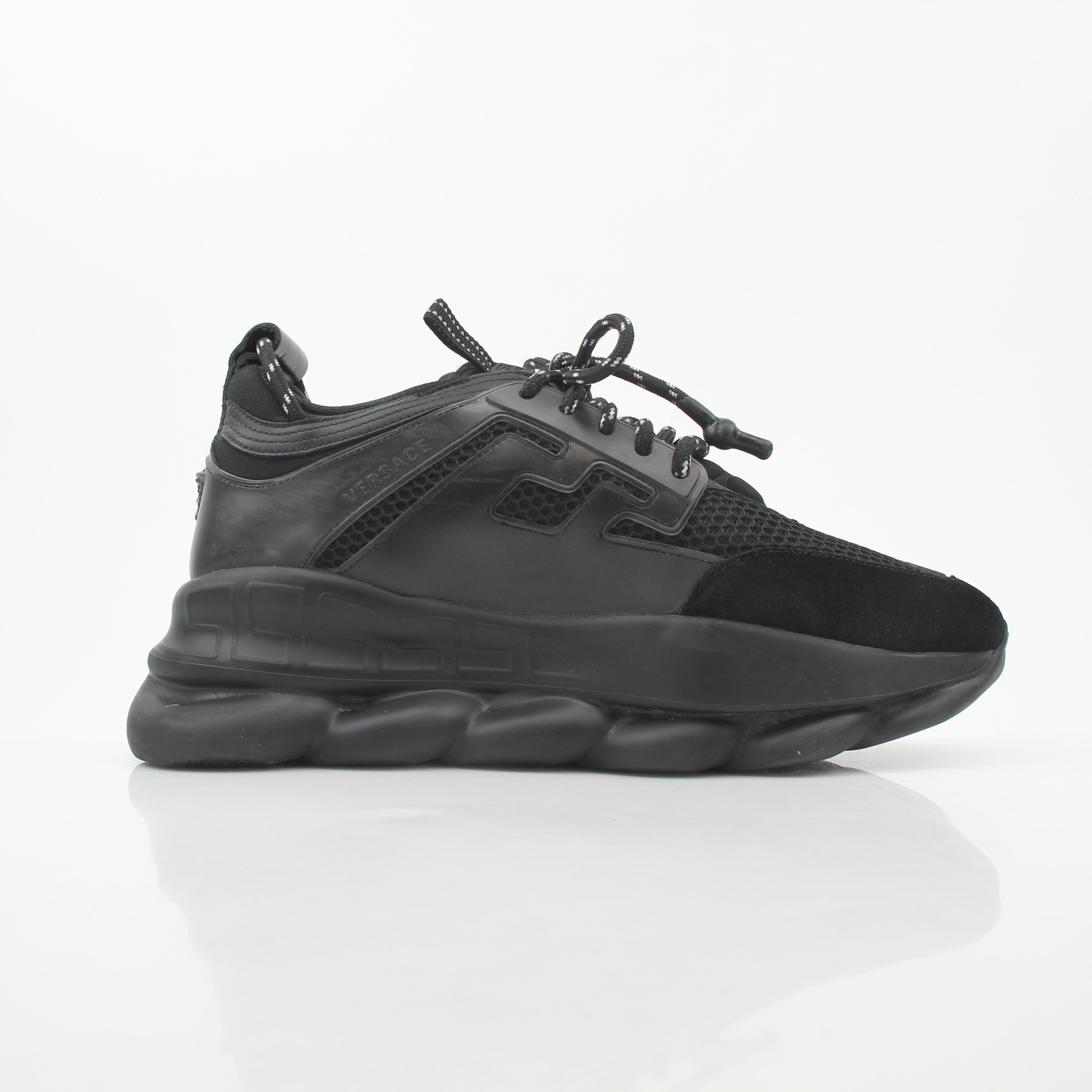 Versace Black Chain Reaction Sneakers by Gold & Beyond showing stylish black shoes with chain details and sporty design.