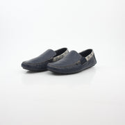 Gucci navy GG Supreme leather driver loafers, stylish men's shoes with classic branding and comfortable slip-on design.