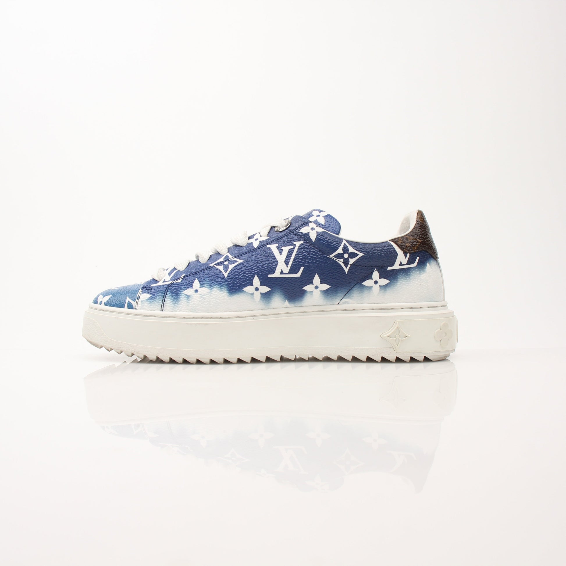 Louis Vuitton Women’s Time Out Sneakers by Gold & Beyond, stylish shoes with LV branding, white and black design, detailed close-up image