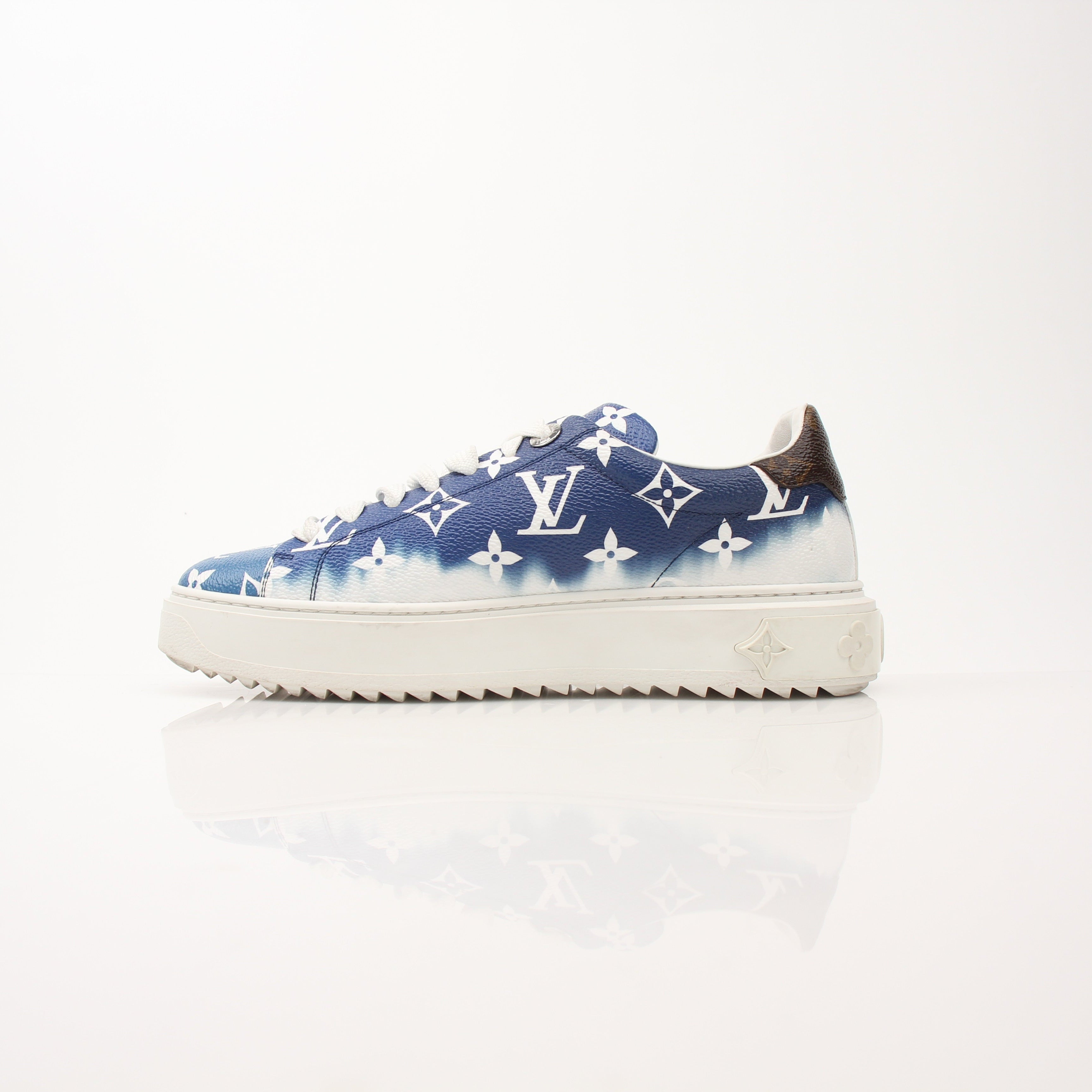Louis Vuitton Women’s Time Out Sneakers by Gold & Beyond, stylish shoes with LV branding, white and black design, detailed close-up image