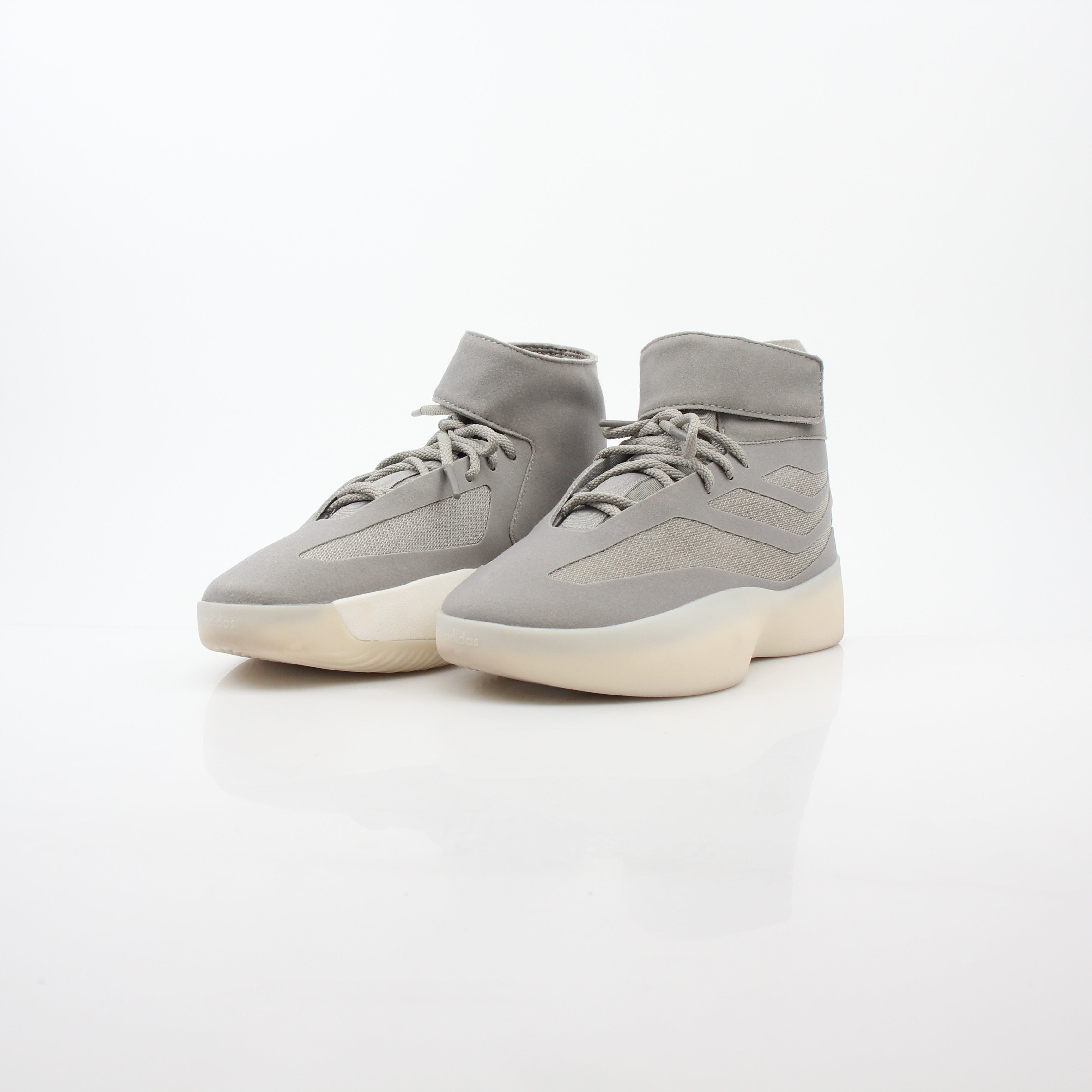 Gold & Beyond Adidas x Fear of God beige Putty Athletics II basketball sneakers, high-top shoes with stylish design.