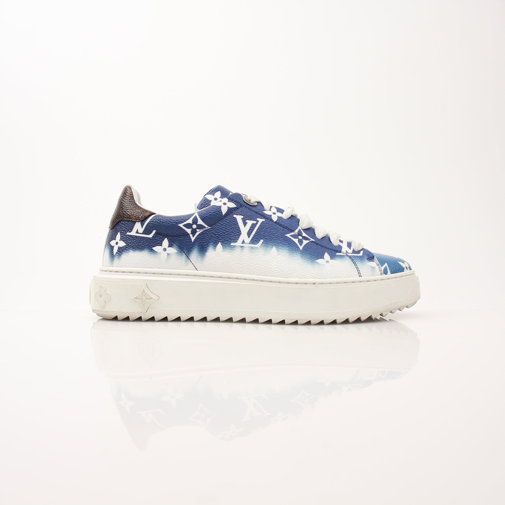 Louis Vuitton Women’s Time Out Sneakers by Gold & Beyond, stylish shoes with white and gold accents, casual and comfortable footwear.