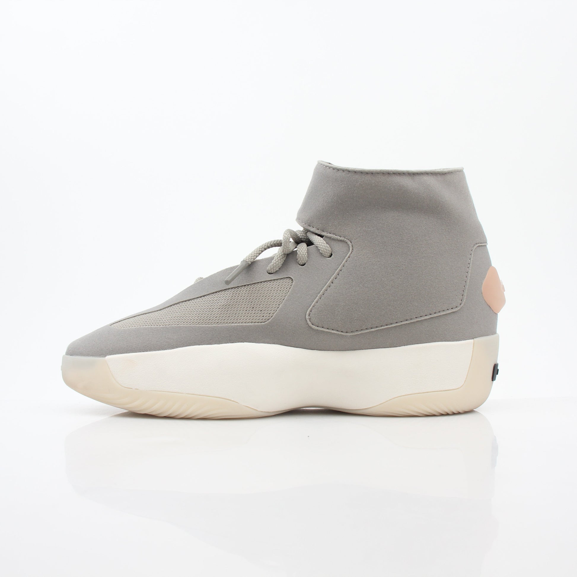 Gold & Beyond Adidas x Fear of God Putty Beige Athletics II basketball sneakers, high-top shoes with beige leather and athletic design.