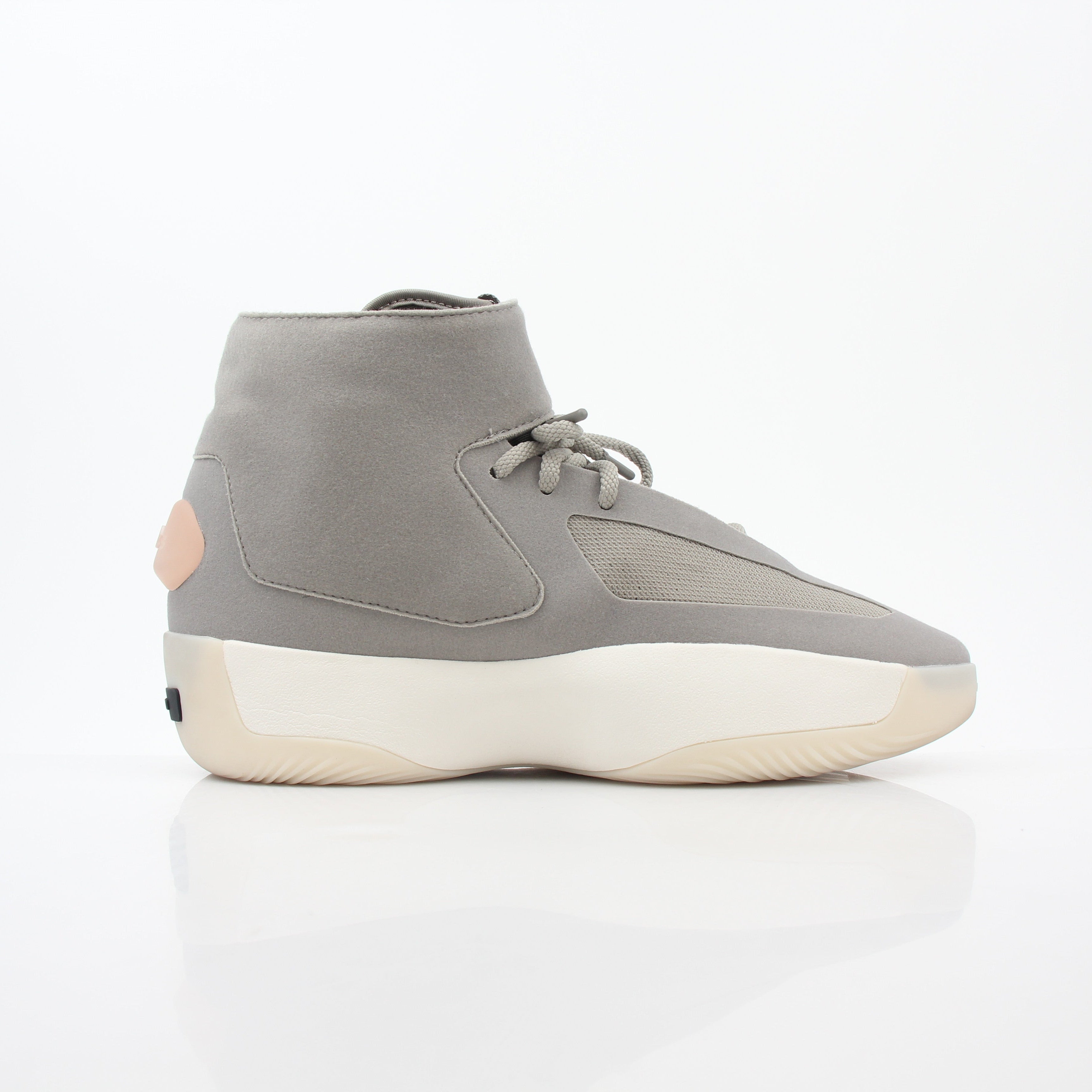 Adidas x Fear of God Putty Beige Athletics II basketball sneakers, high-top shoes with beige and white accents, gold eyelets.