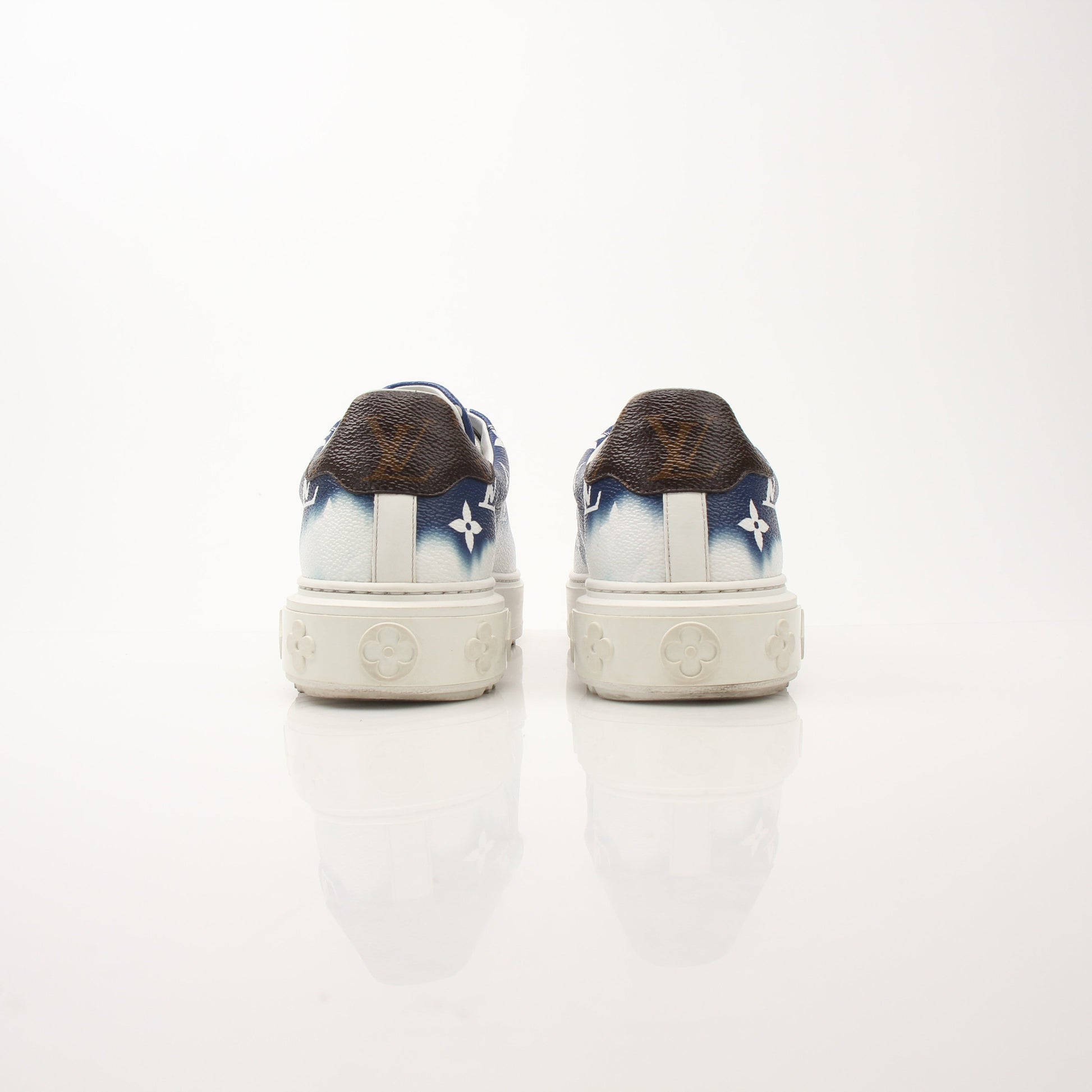 Louis Vuitton Women’s Time Out Sneakers by Gold & Beyond, stylish casual shoes with LV branding and white athletic design.
