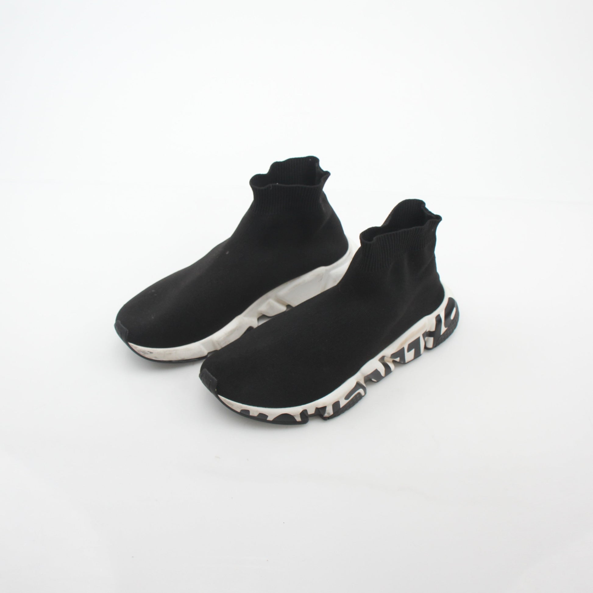 Black Balenciaga Speed Graffiti Sock Sneakers with bold graffiti design, high-top style, and sleek athletic look.