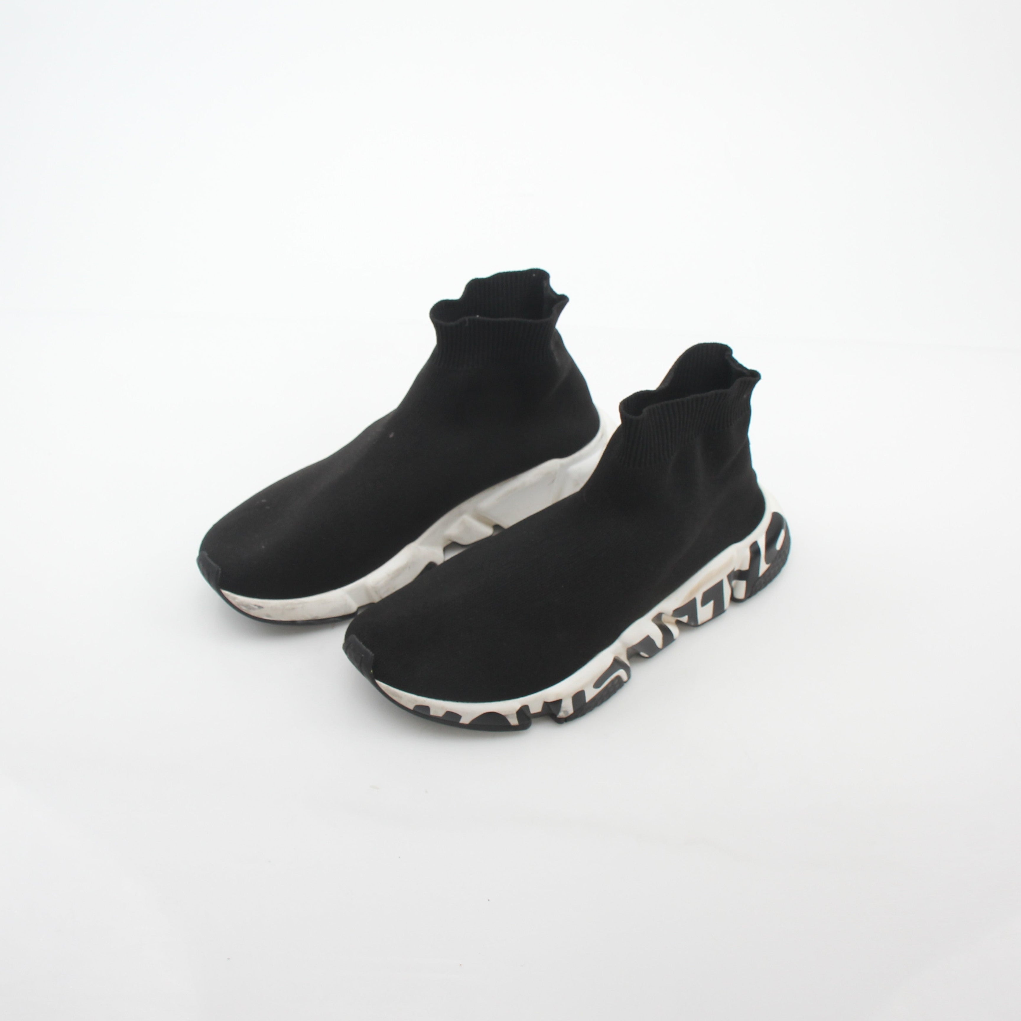 Black Balenciaga Speed Graffiti Sock Sneakers with bold graffiti design, high-top style, and sleek athletic look.