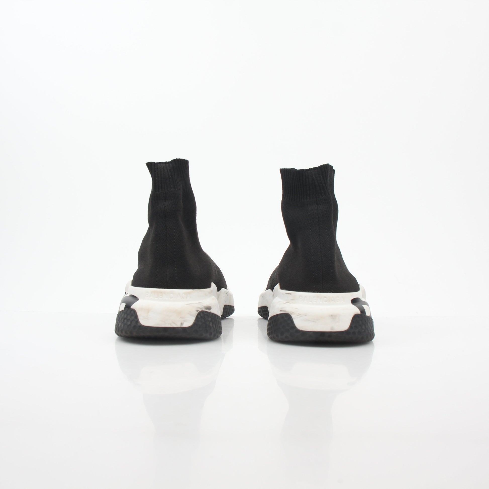 Black Balenciaga Speed Graffiti Sock Sneakers displayed with their sleek, modern design and distinctive graffiti accents.