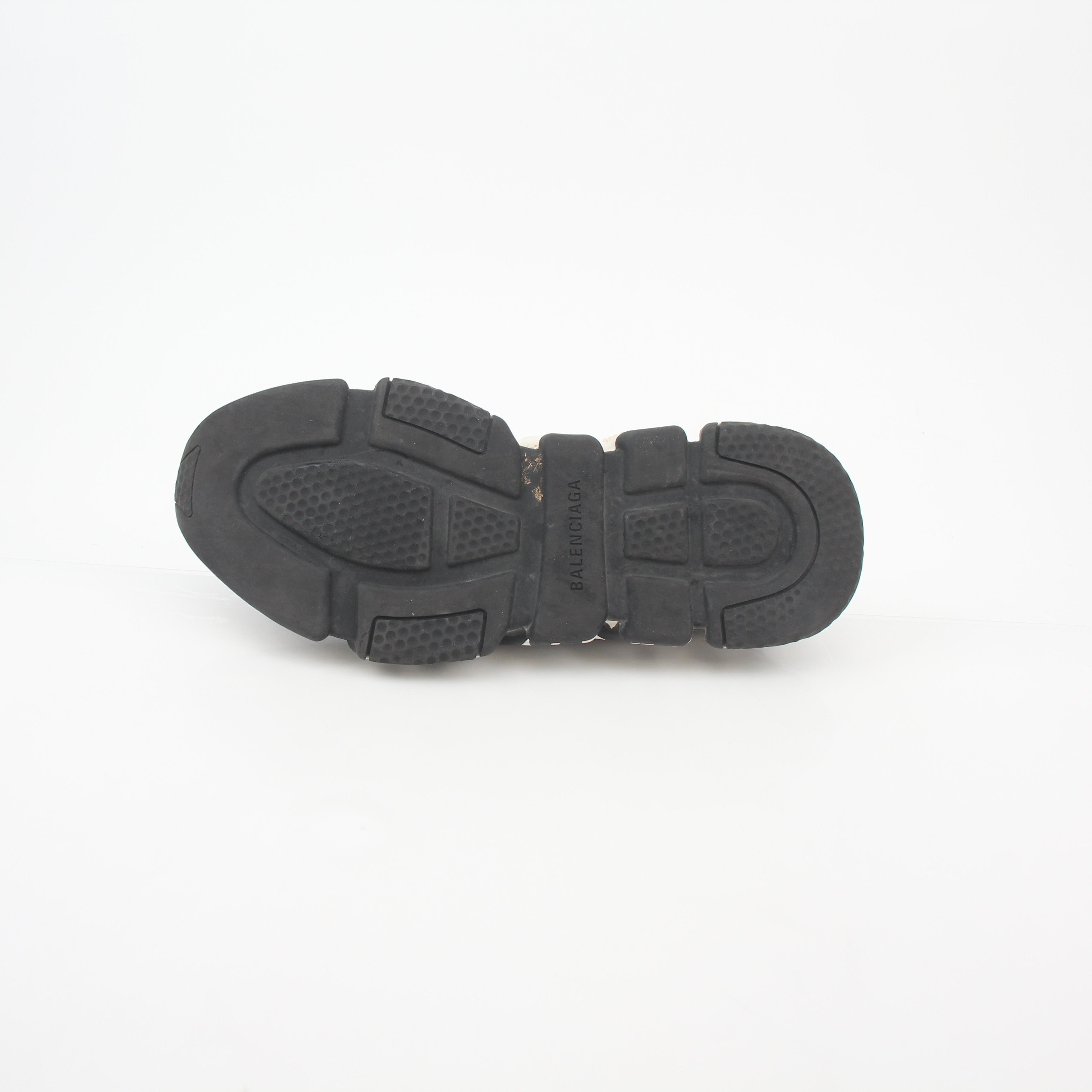 Black Balenciaga Speed Graffiti Sock Sneakers with graffiti-inspired design and sleek athletic style by Gold & Beyond.