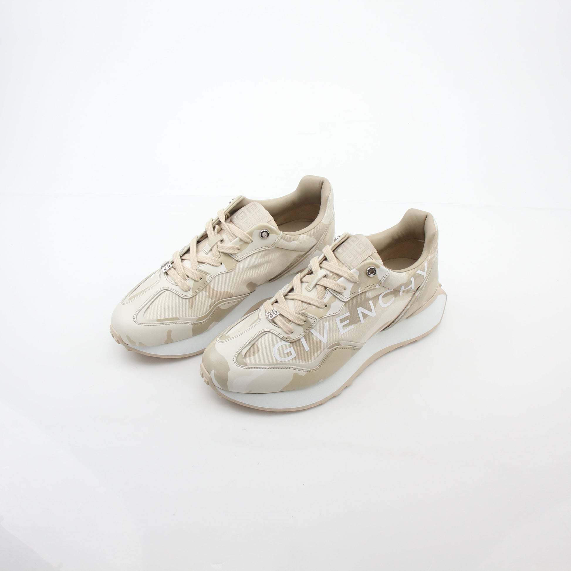 Beige Givenchy GIV Runner logo camo sneakers by Gold & Beyond, featuring stylish camouflage pattern and athletic shoe design.