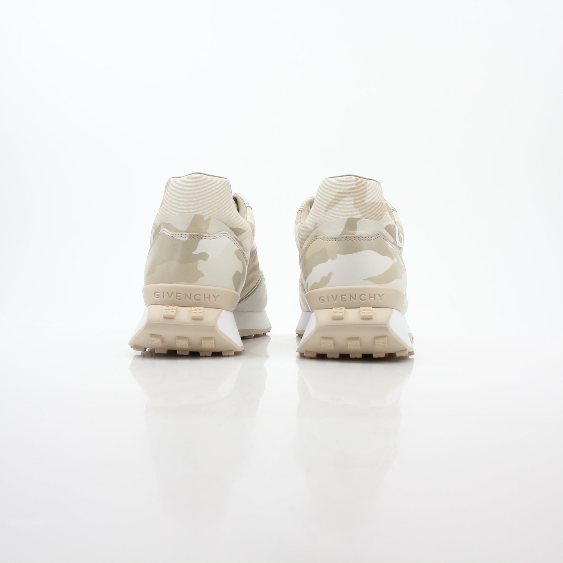 Gold & Beyond beige Givenchy GIV Runner logo camo sneakers featuring stylish design and logo details, perfect for casual wear.