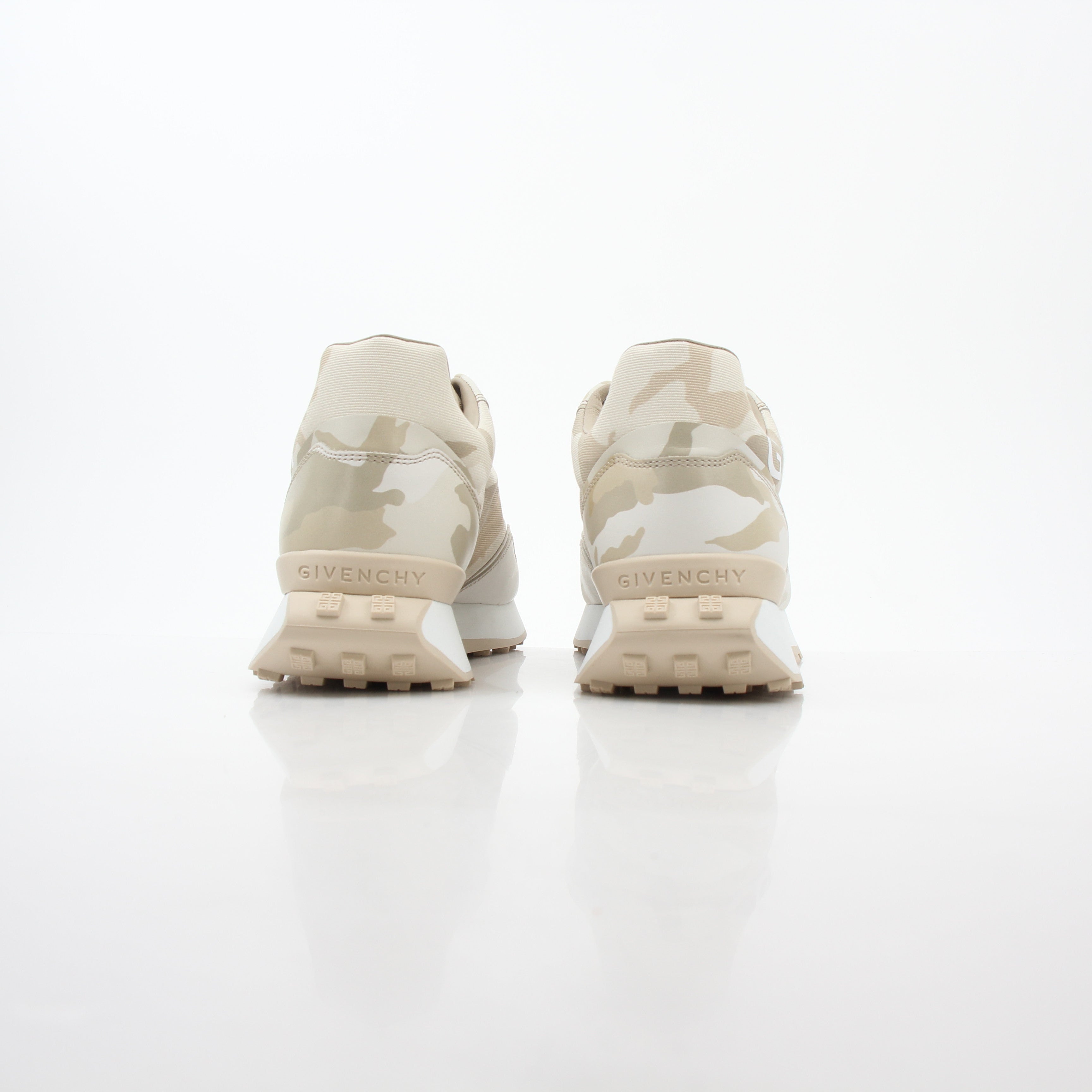 Gold & Beyond beige Givenchy GIV Runner logo camo sneakers featuring stylish design and logo details, perfect for casual wear.