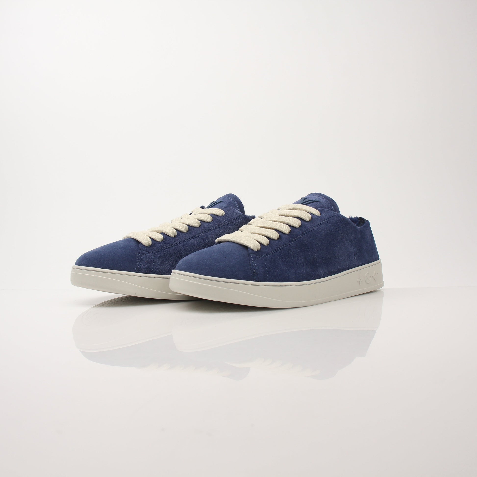 Louis Vuitton Men’s LV Resort Sneakers featuring stylish design and premium materials, displayed on a clean background.