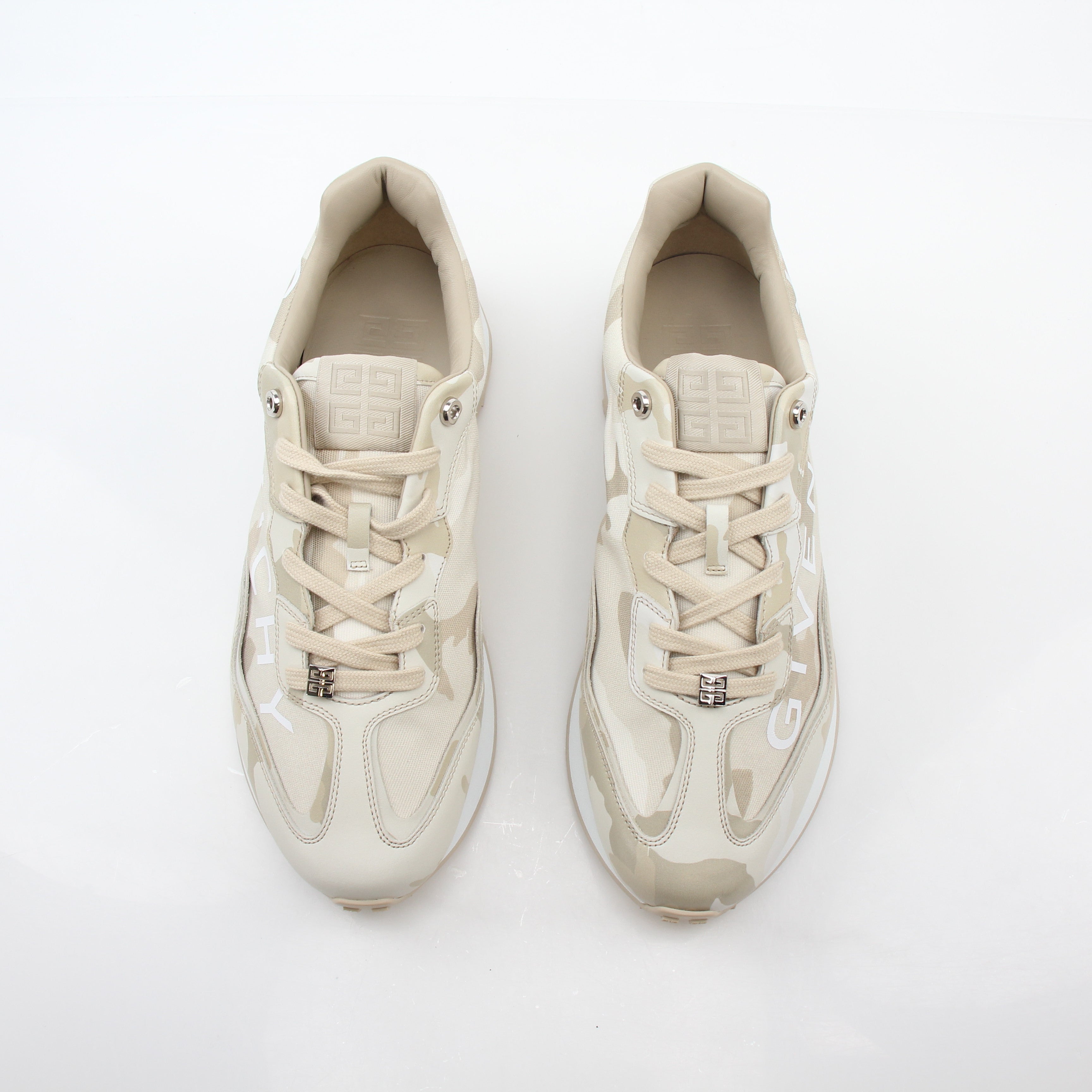 Givenchy beige GIV Runner logo camo sneakers, Gold & Beyond shoes with camouflage pattern and logo details, front view.