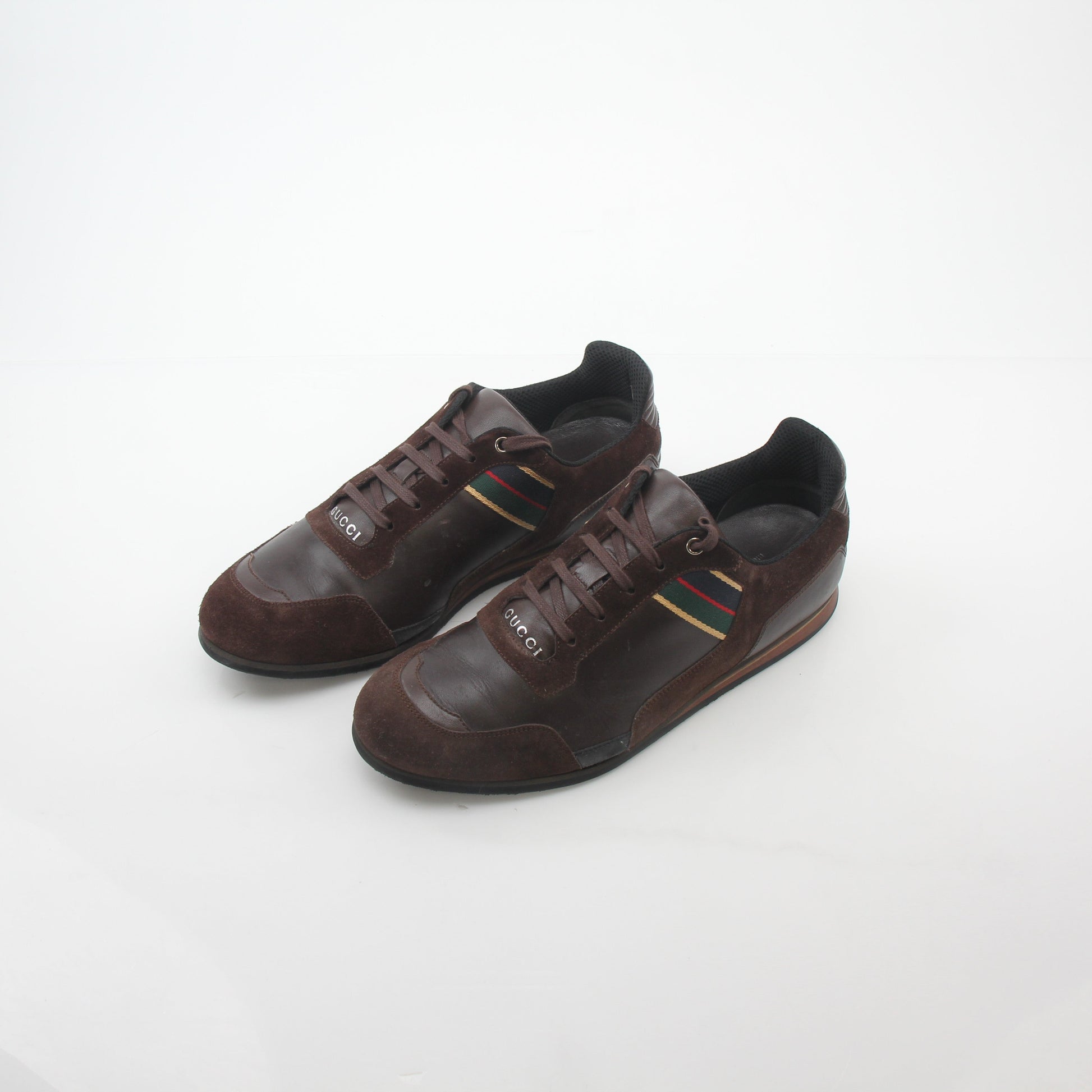 Gold & Beyond Gucci Brown Web Accent leather and suede low-top sneakers with stylish design and contrasting materials.