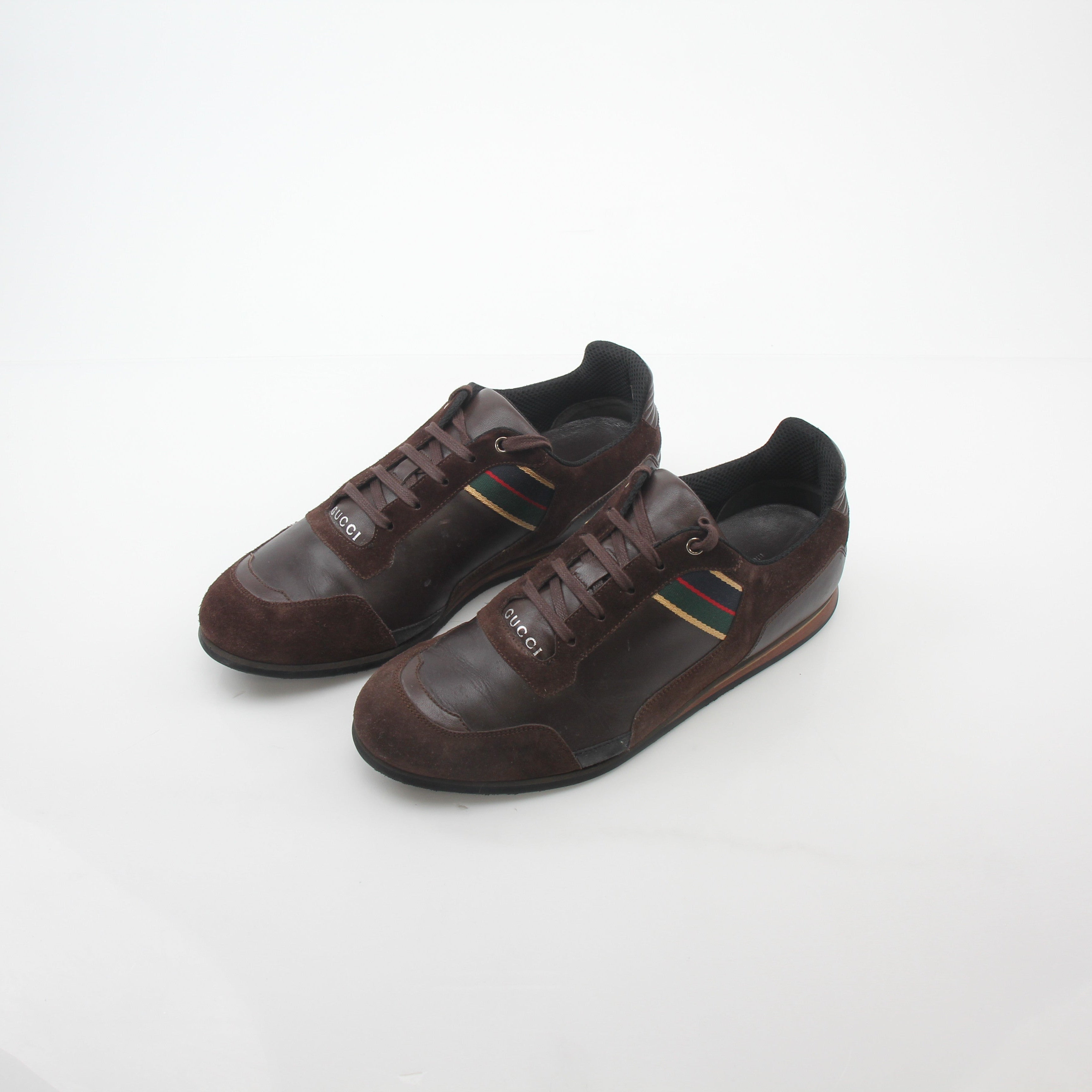 Gold & Beyond Gucci Brown Web Accent leather and suede low-top sneakers with stylish design and contrasting materials.