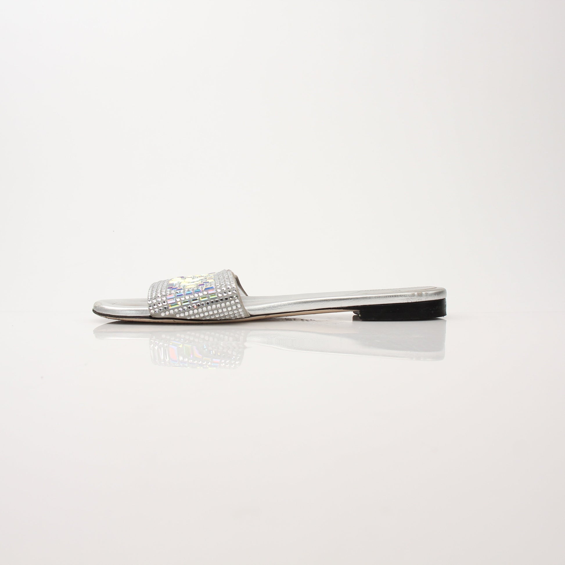 Fendi Women’s Crystal Embellished Signature Slides shoes with sparkling crystal details and branded design.