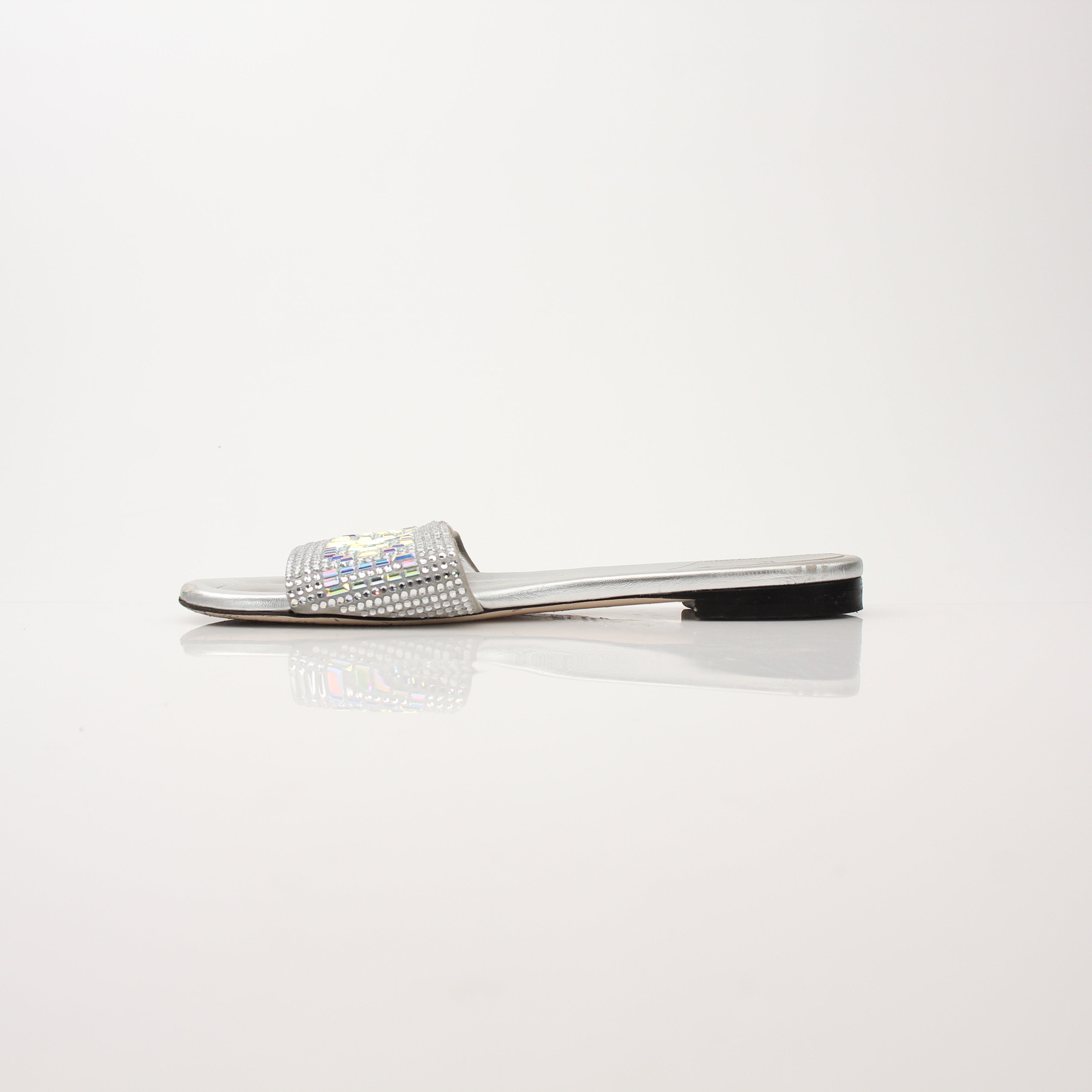 Fendi Women’s Crystal Embellished Signature Slides shoes with sparkling crystal details and branded design.