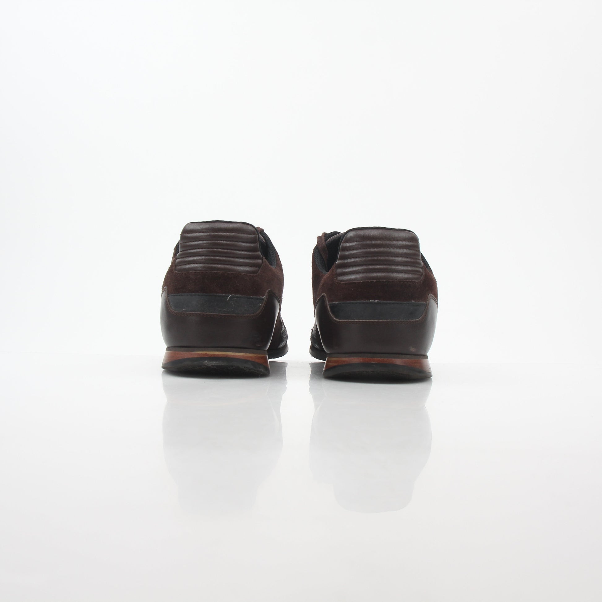 Gold & Beyond Gucci Brown Web Accent leather and suede low-top sneakers with stylish design and contrasting details.