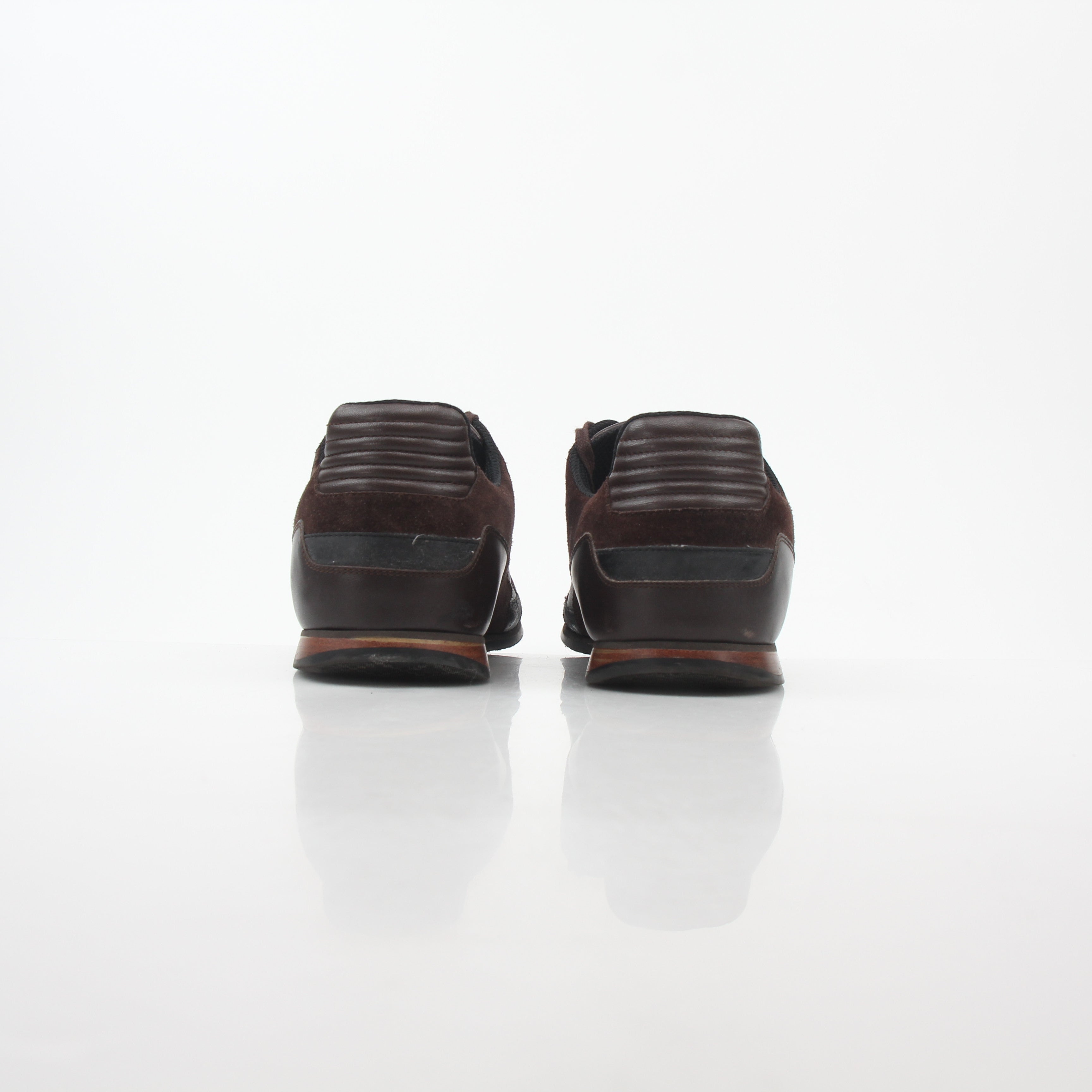 Gold & Beyond Gucci Brown Web Accent leather and suede low-top sneakers with stylish design and contrasting details.