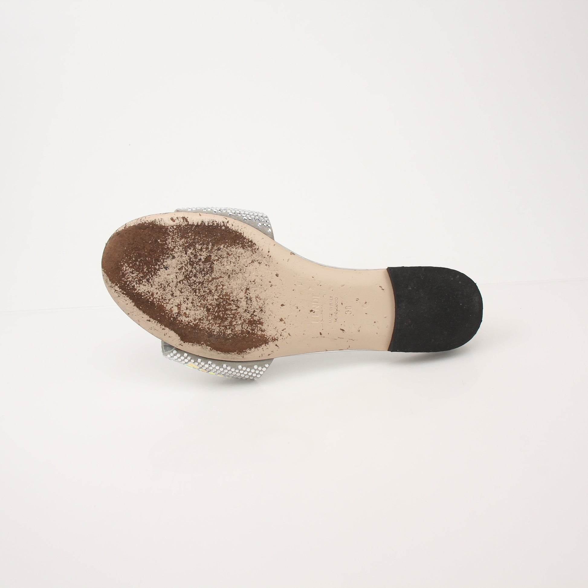 Gold & Beyond Fendi women’s crystal-embellished signature slide shoes with sleek design and luxurious details.