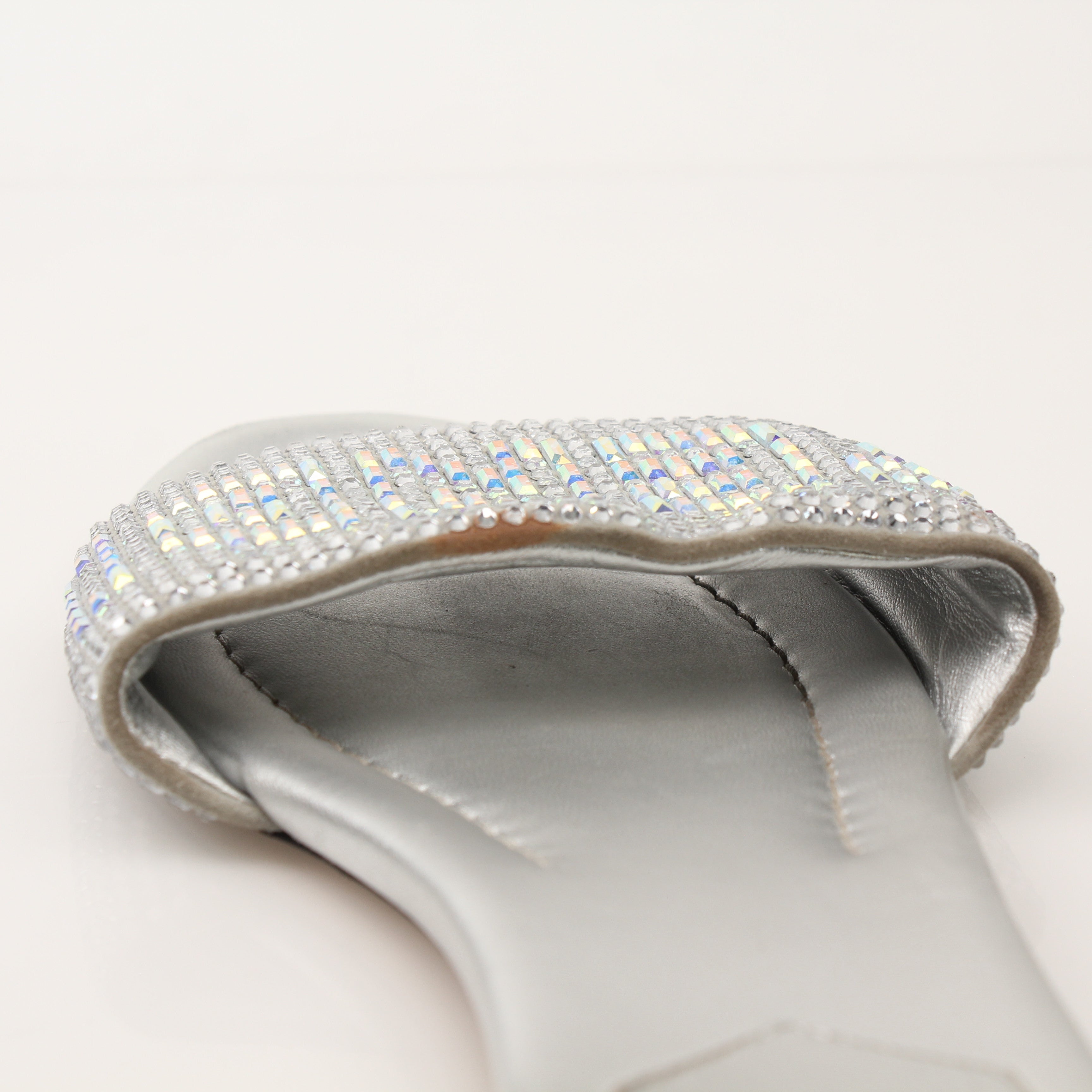 Fendi women's signature slides with crystal embellishments, gold-tone straps, and stylish design, ideal for fashionable summer footwear.