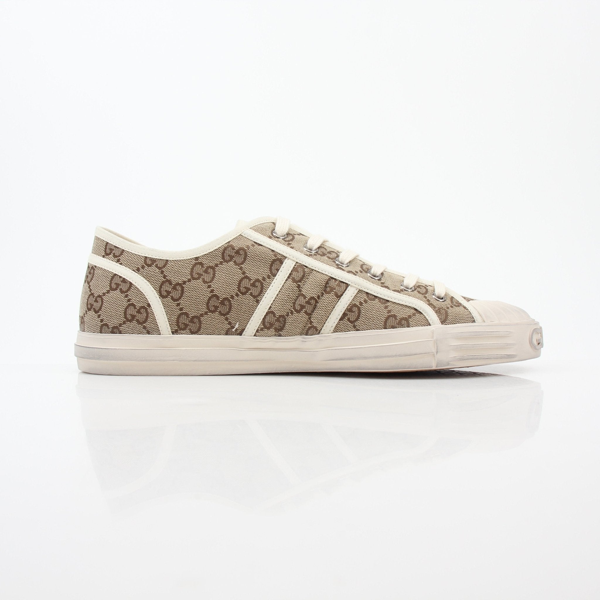 Gold & Beyond Gucci GG Supreme Sneakers, stylish shoes featuring signature monogram pattern and classic design on a white background.