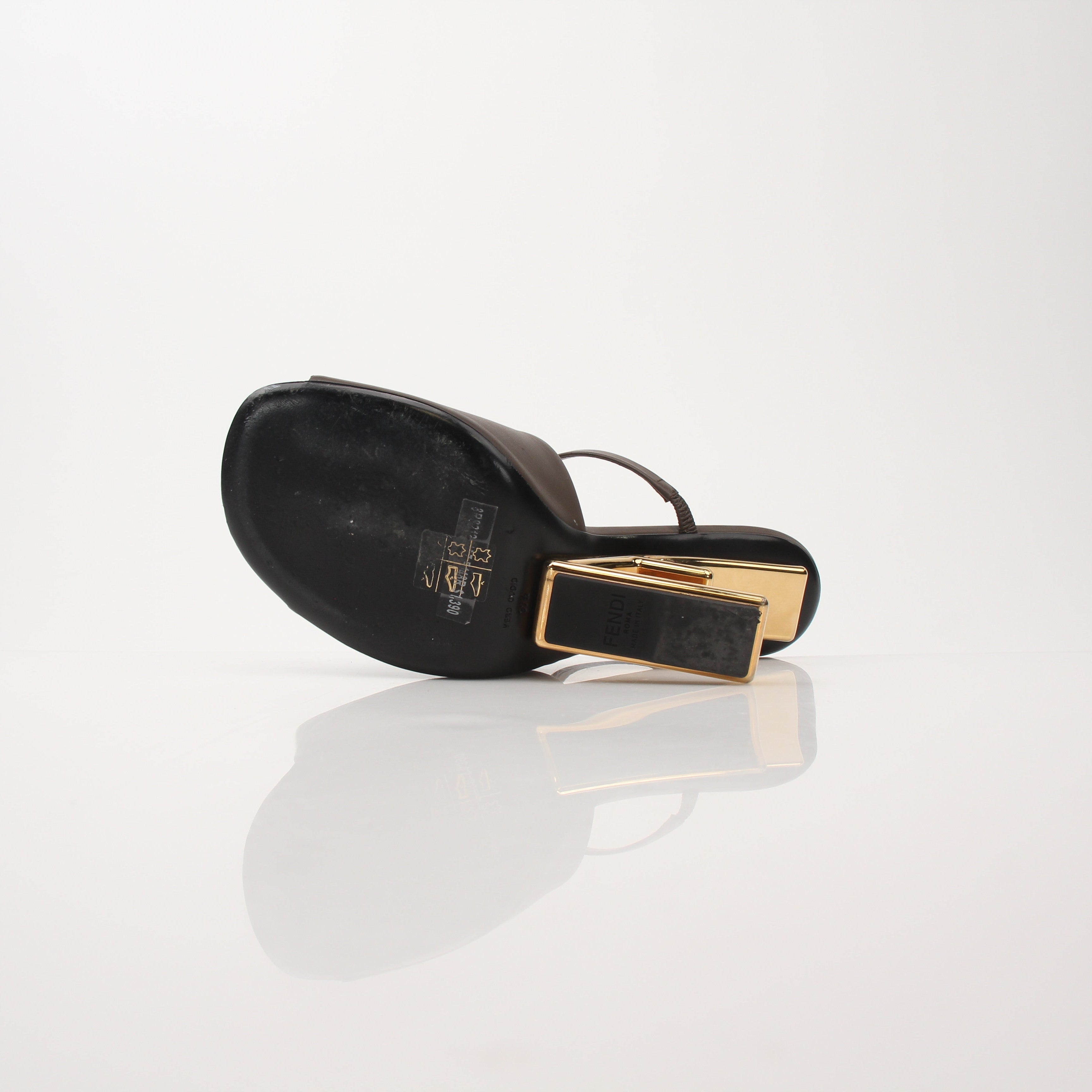 Fendi First sculpted heel sandals with pointed toes and elegant design, displayed on a neutral background.