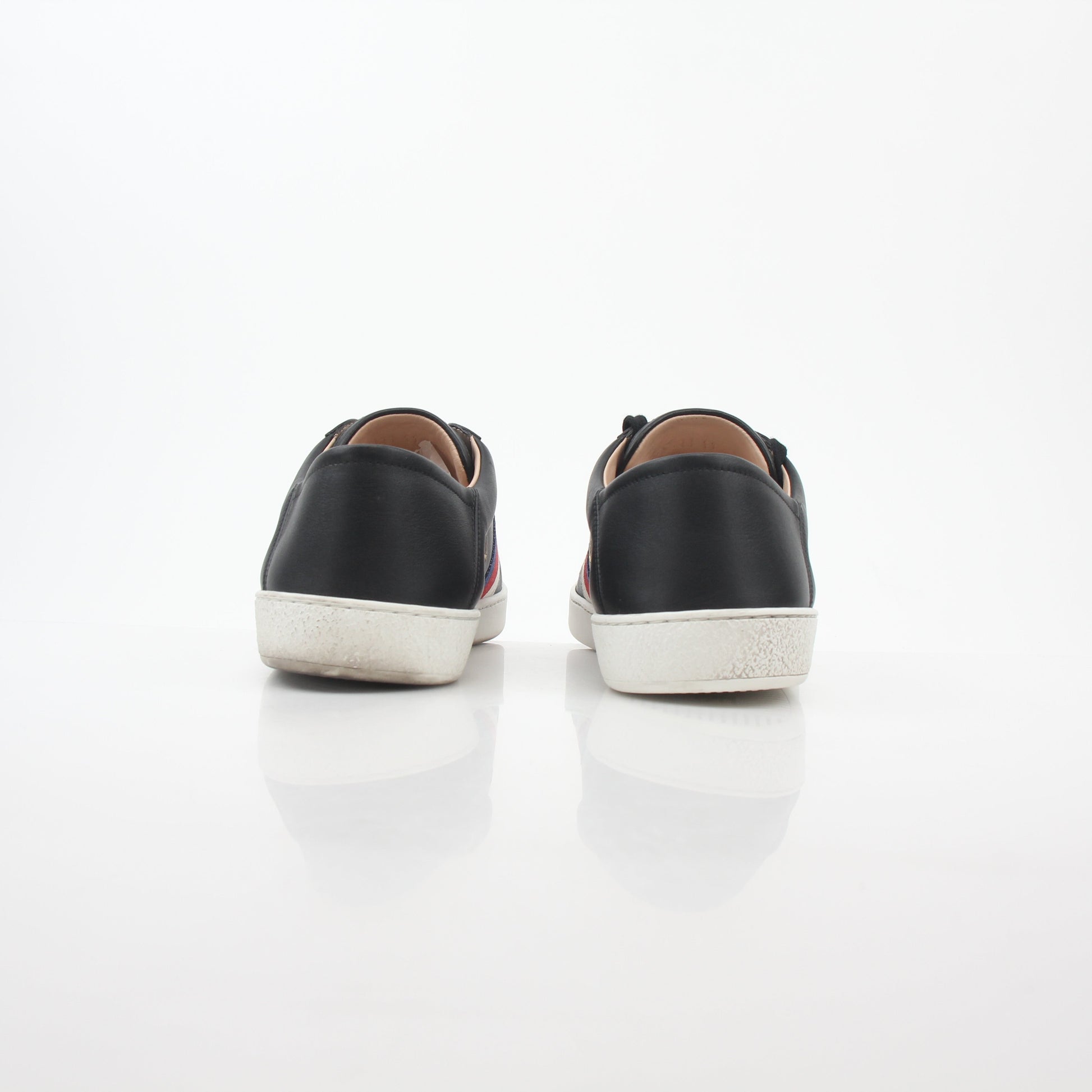 Gucci black embroidered Ace Web low-top sneakers with signature design, stylish shoes for casual and fashionable wear.