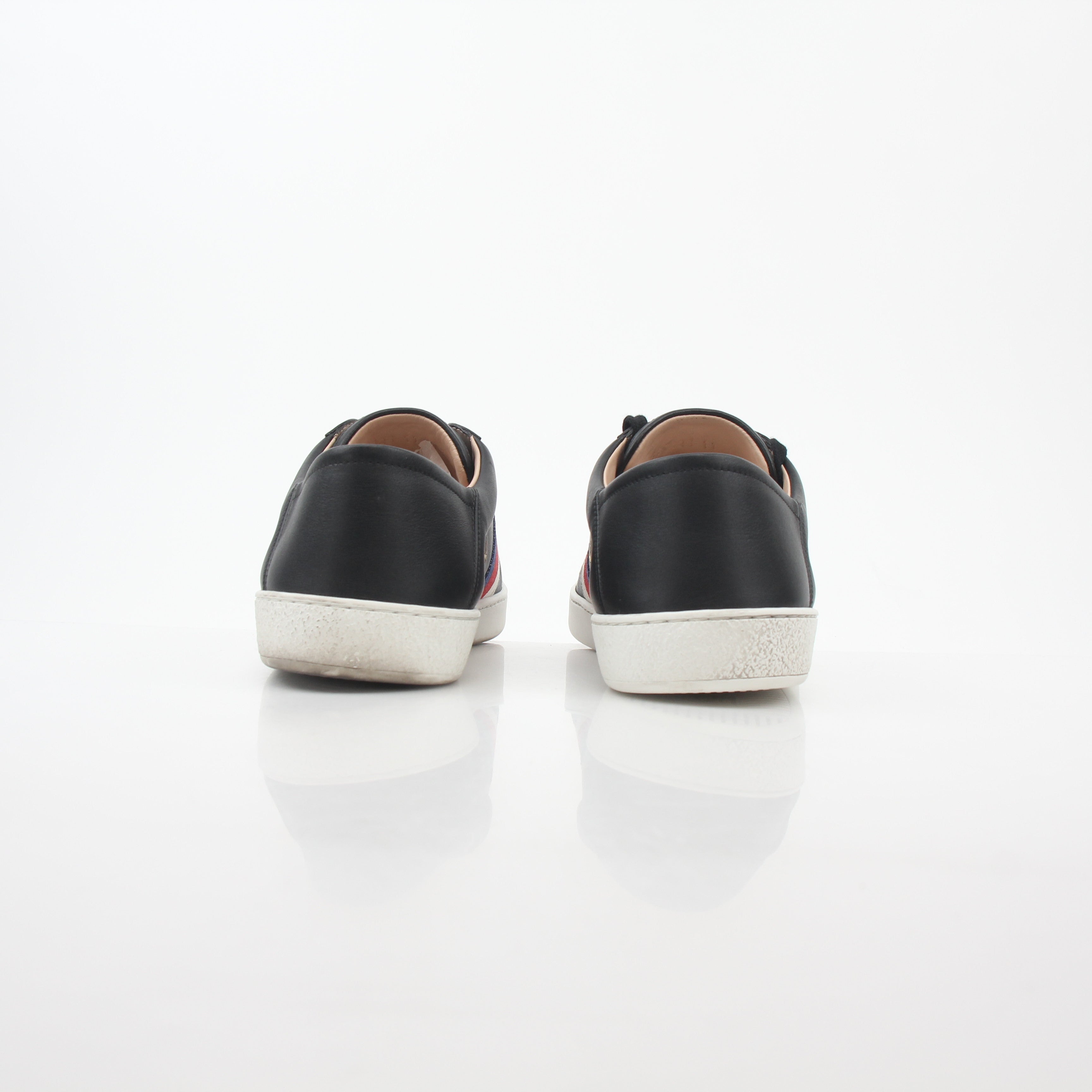 Gucci black embroidered Ace Web low-top sneakers with signature design, stylish shoes for casual and fashionable wear.
