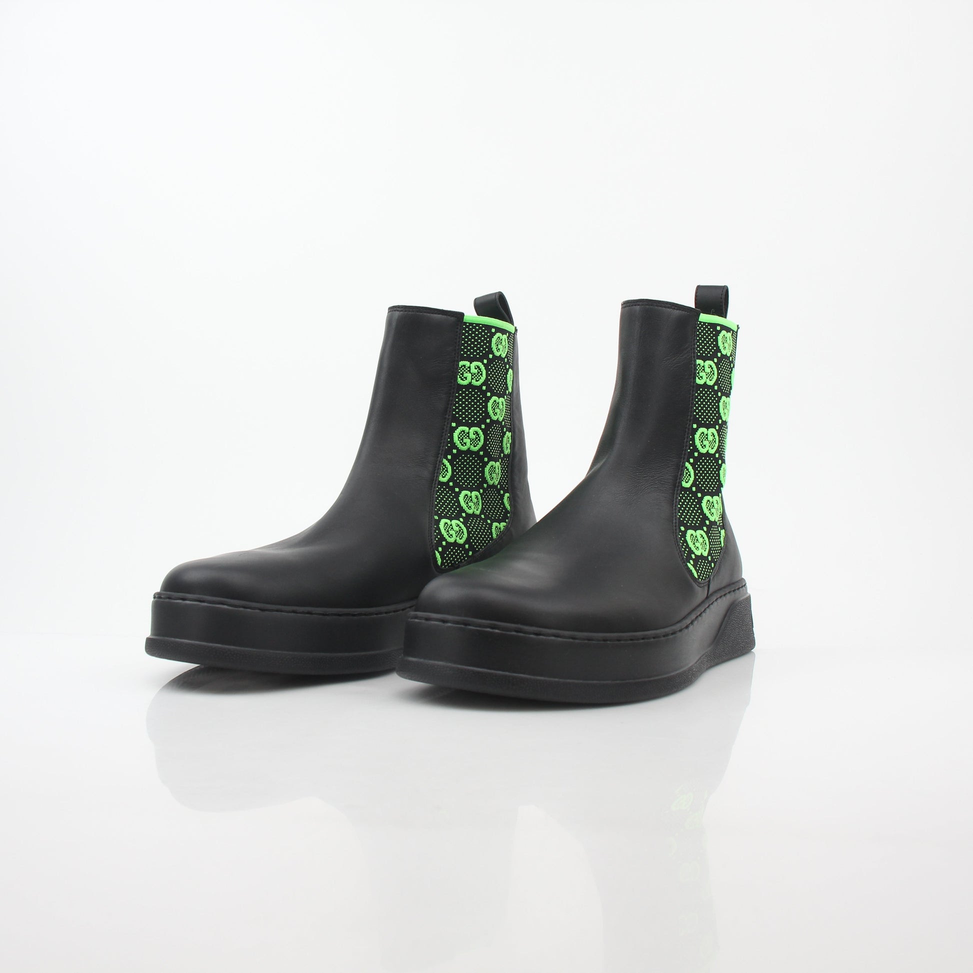 Gucci black and neon green GG Dali ankle boots, stylish shoes with bold color accents and designer branding.