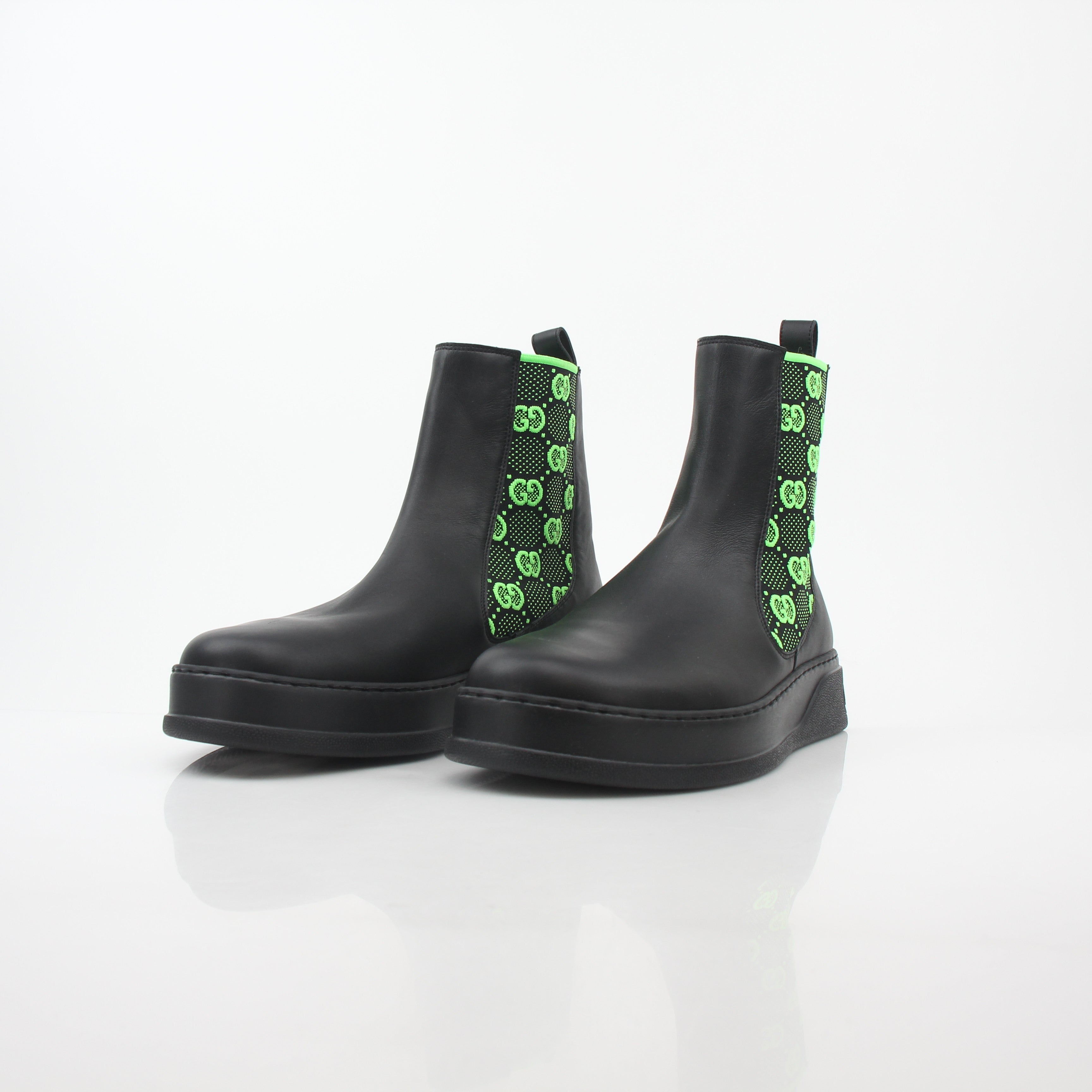 Gucci black and neon green GG Dali ankle boots, stylish shoes with bold color accents and designer branding.