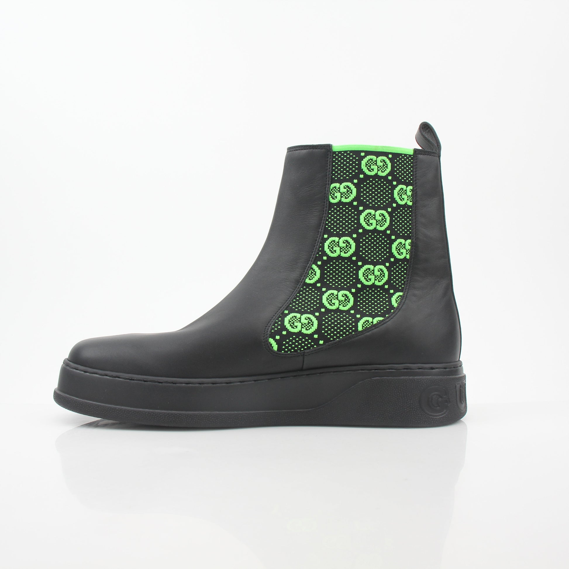Gucci black and neon green GG Dali ankle shoes by Gold & Beyond, featuring bold color accents and stylish ankle boot design.