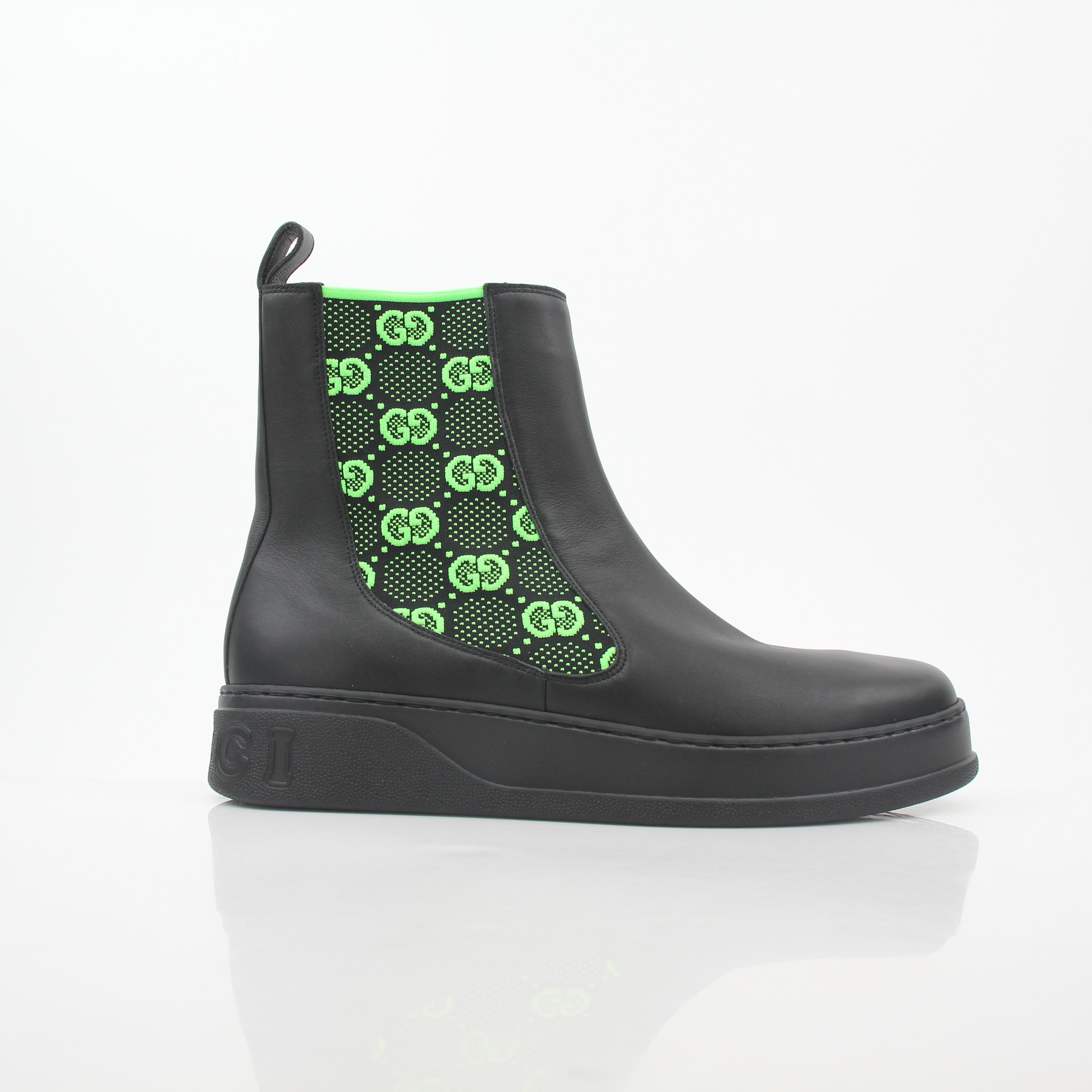 Gold & Beyond Gucci black and neon green GG Dali ankle boots, stylish shoes with bold color accents and unique design details.