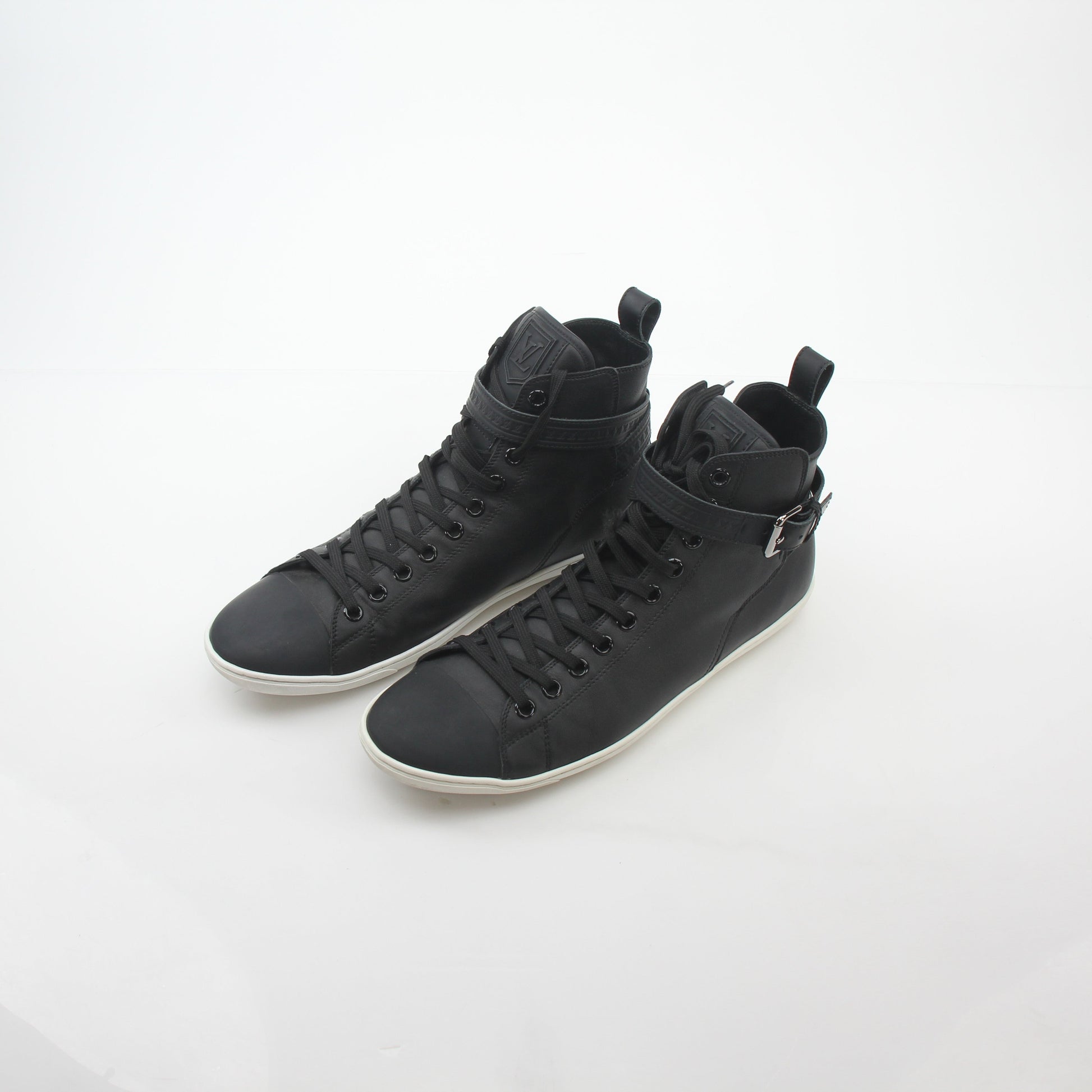 Louis Vuitton black Falcon high-top sneakers by Gold & Beyond, featuring sleek black leather and stylish high-top design.