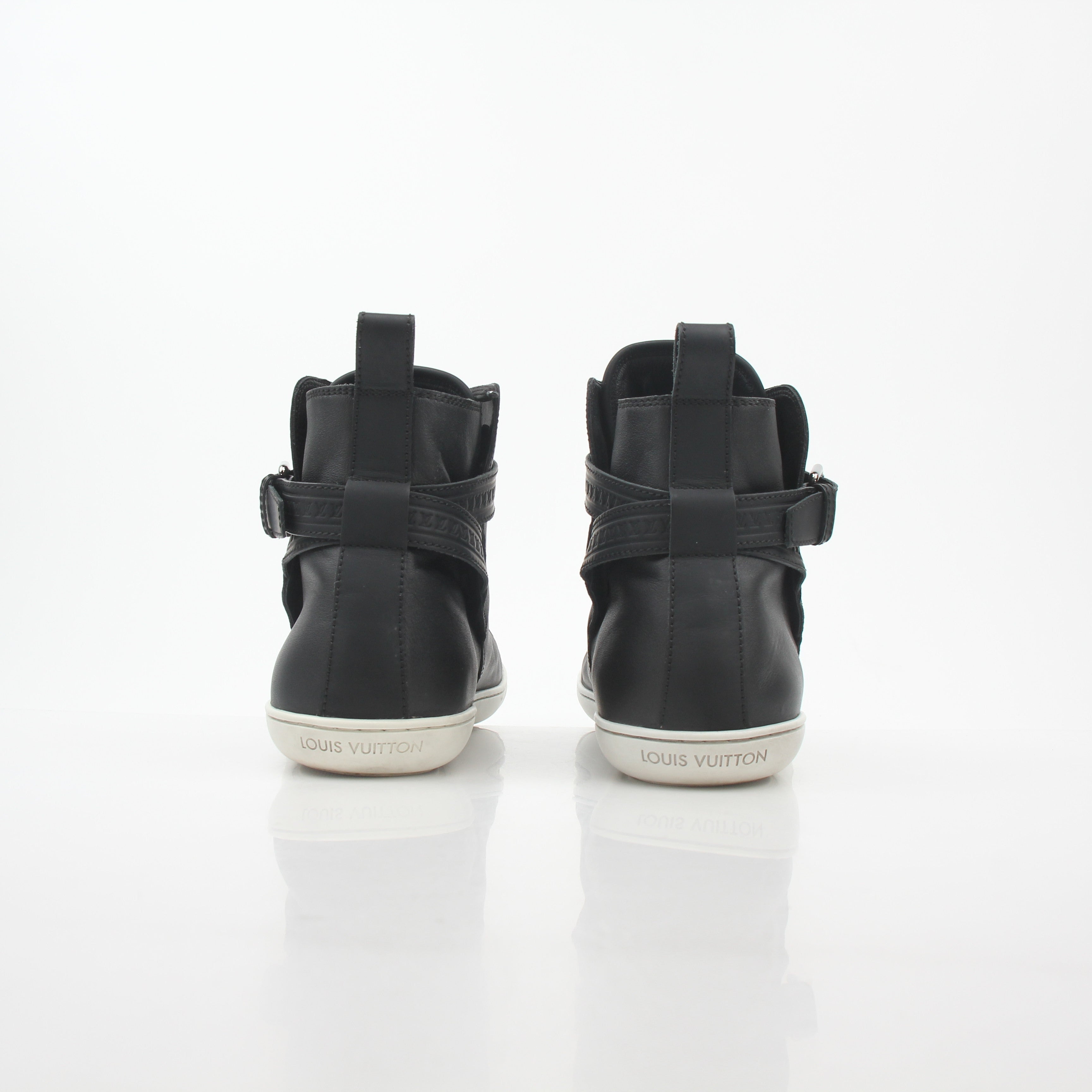 Gold & Beyond Louis Vuitton black Falcon high-top sneakers with stylish design and premium materials.