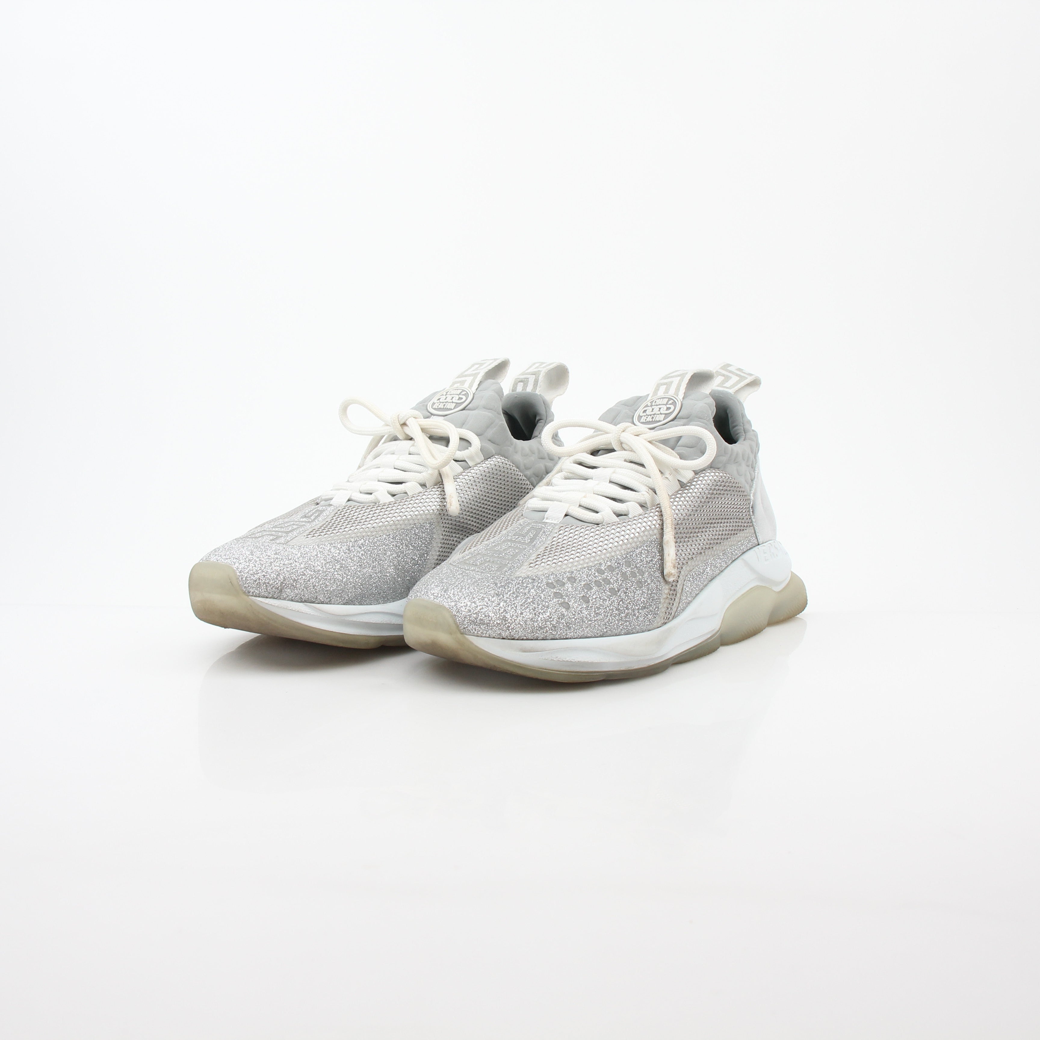 Versace Silver Chain Reaction Glitter low-top sneakers with stylish design, featuring silver accents and a trendy sneaker silhouette.