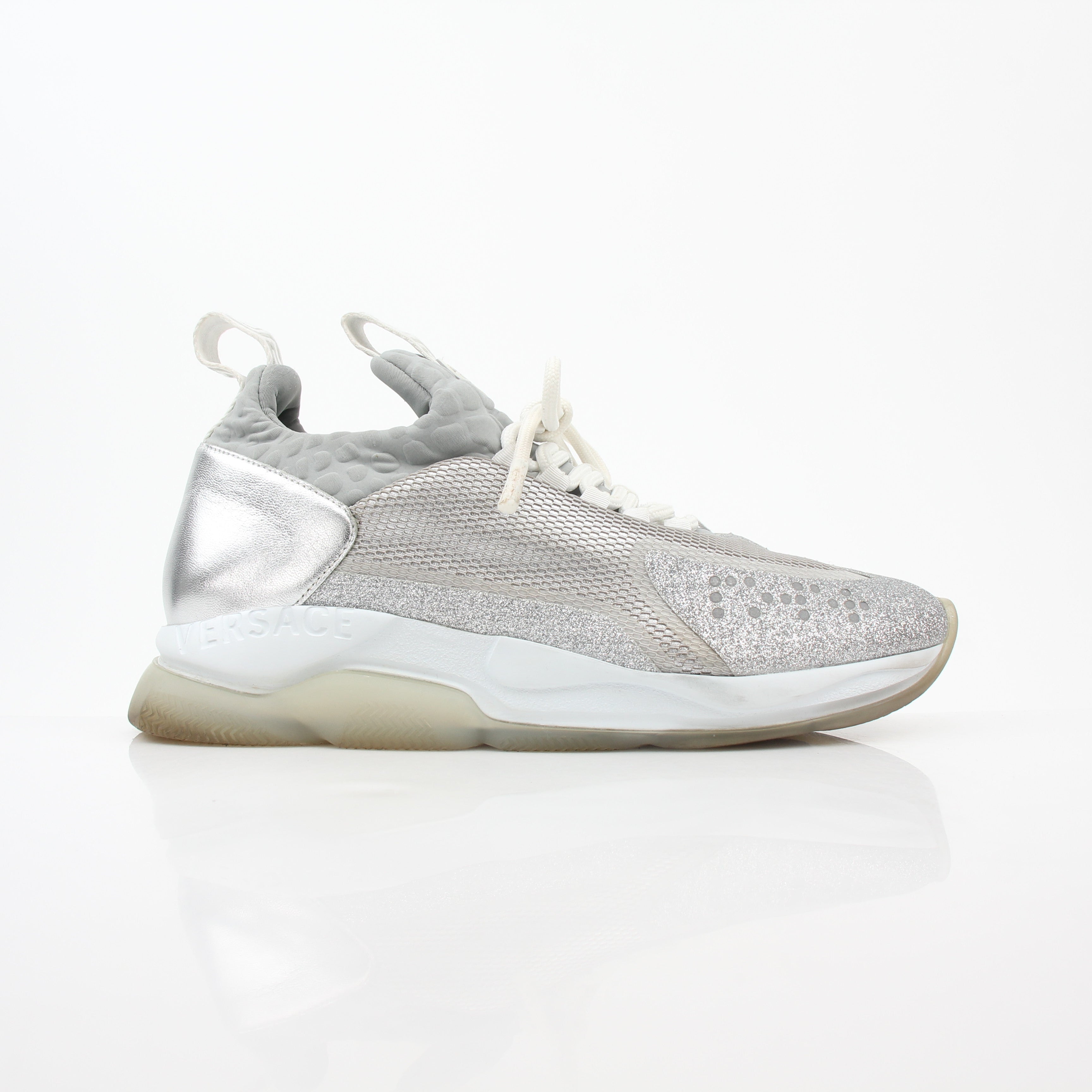 Versace Silver Chain Reaction Glitter Low-Top Sneakers by Gold & Beyond, featuring shiny silver exterior and stylish low-top design.