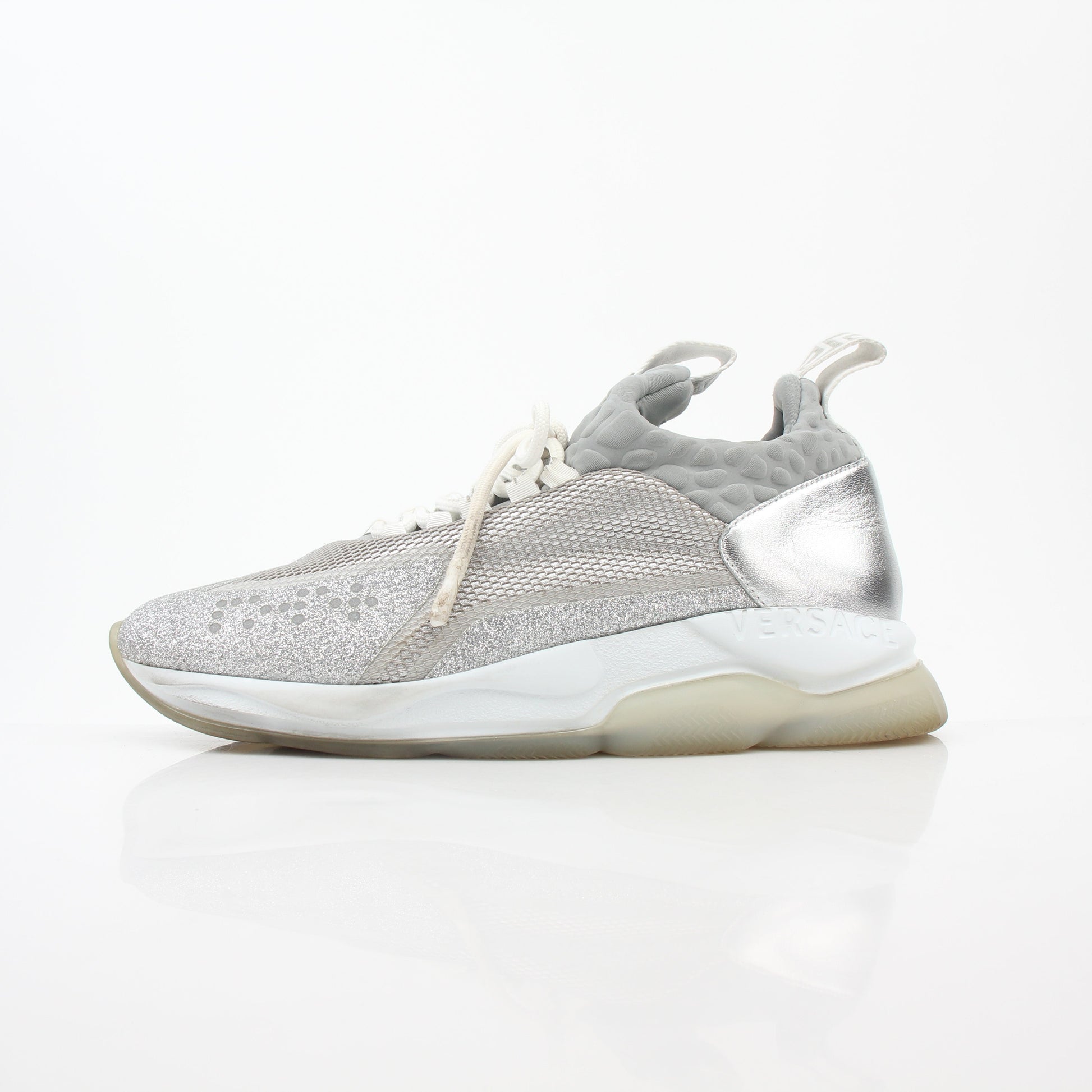 Versace Silver Chain Reaction Glitter low-top sneakers with metallic finish and stylish design, by Gold & Beyond.