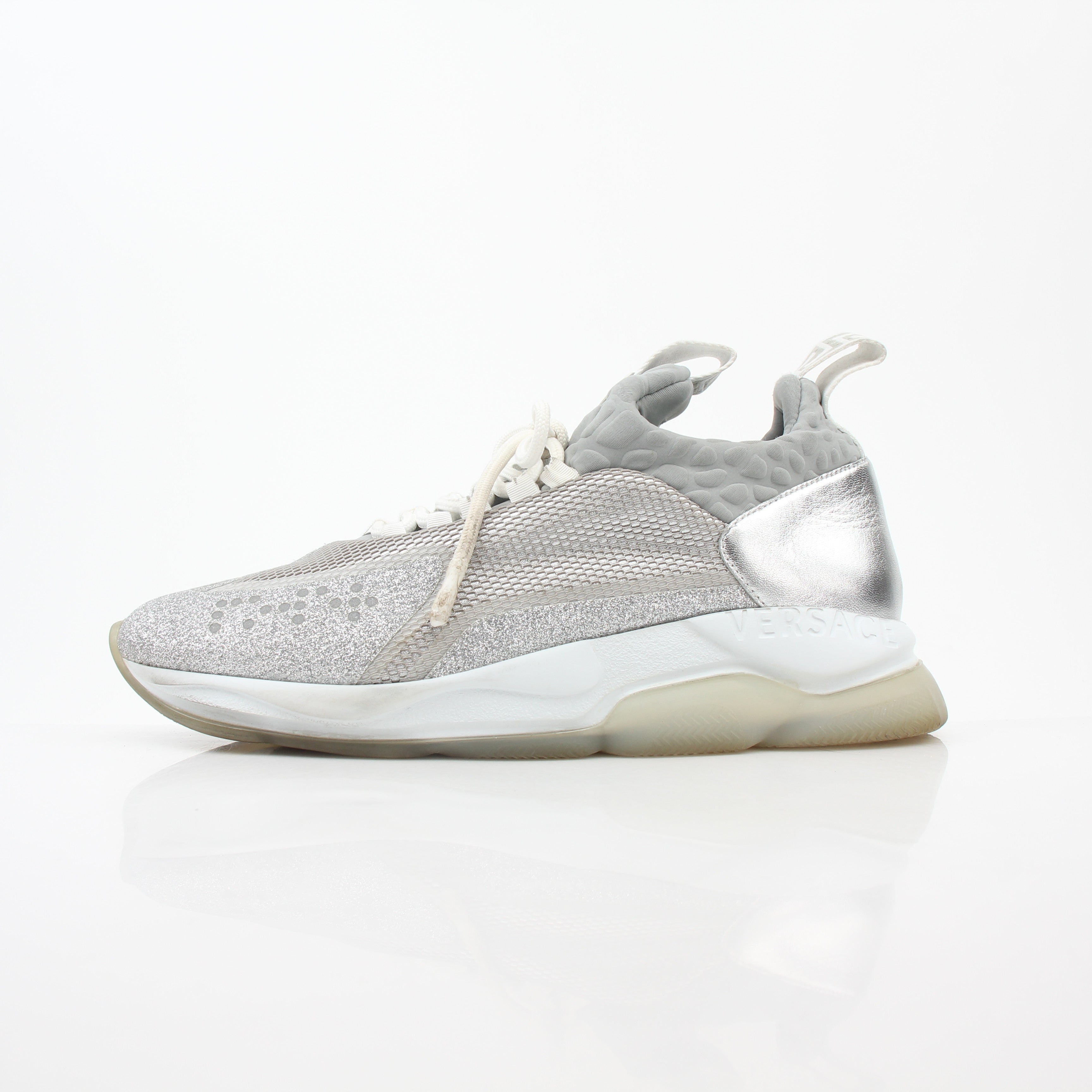 Versace Silver Chain Reaction Glitter low-top sneakers with metallic finish and stylish design, by Gold & Beyond.