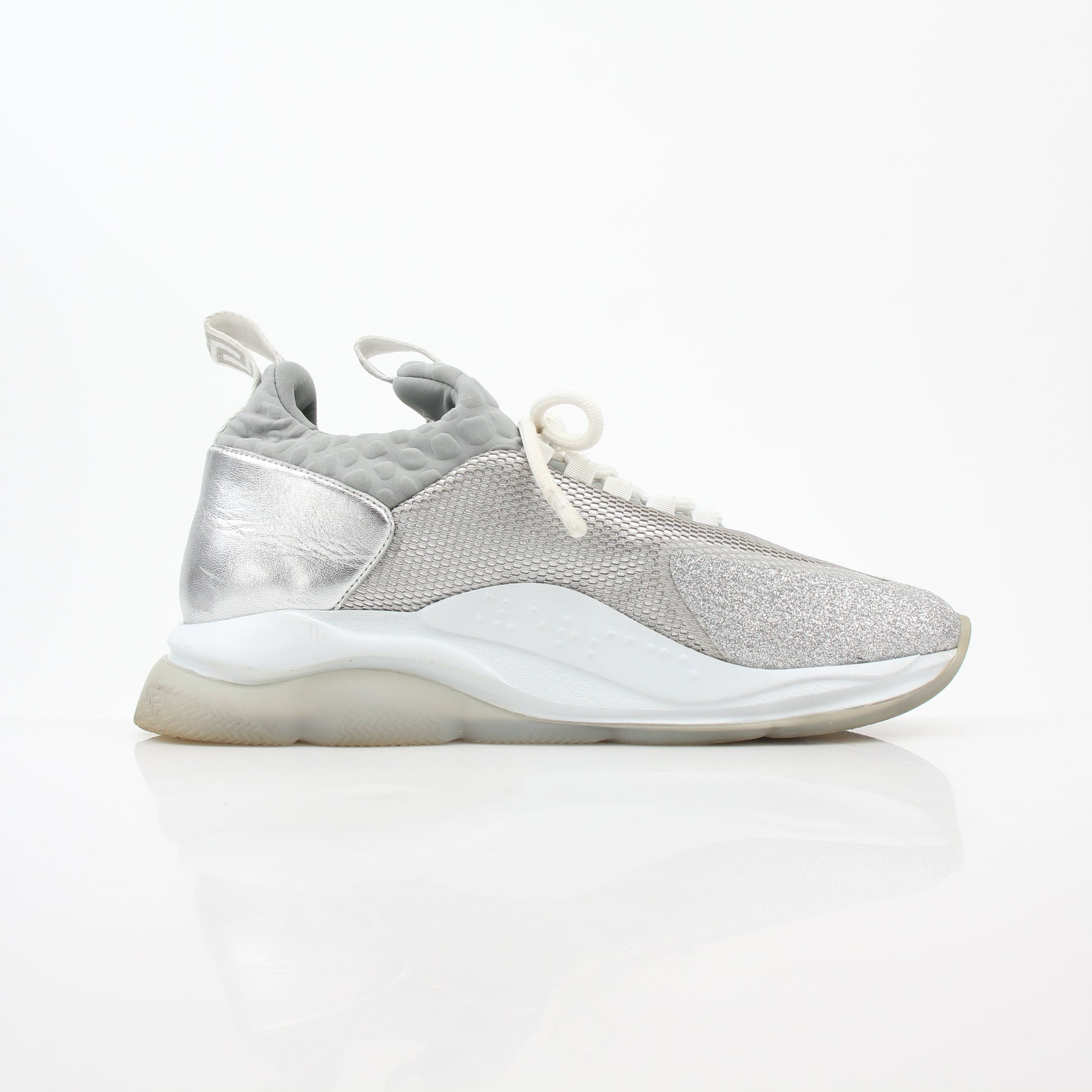 Versace Silver Chain Reaction Glitter low-top sneakers with metallic finish and stylish design, by Gold & Beyond.