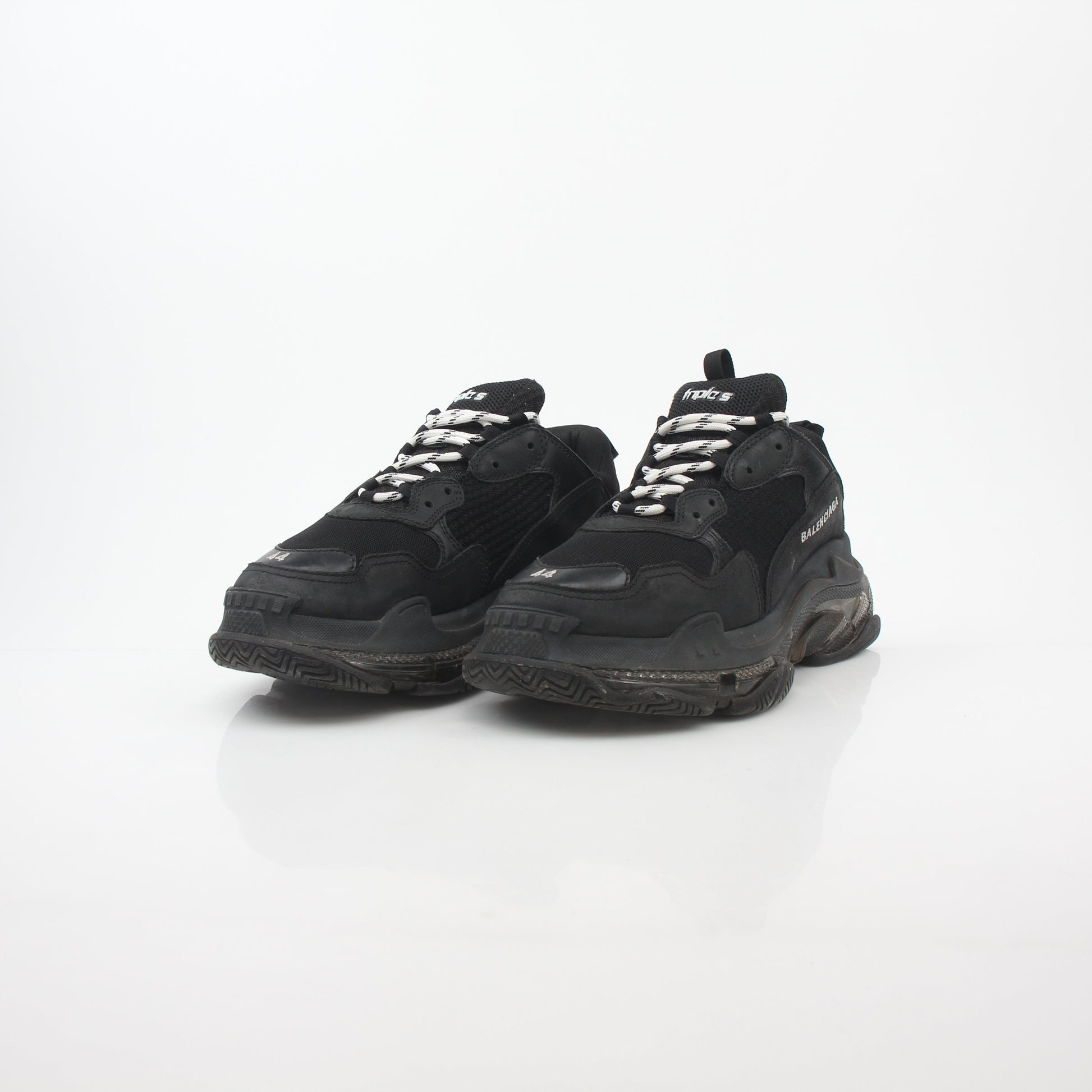Black Balenciaga Triple S sneakers with clear sole, showcasing chunky design and sporty style from Gold & Beyond.