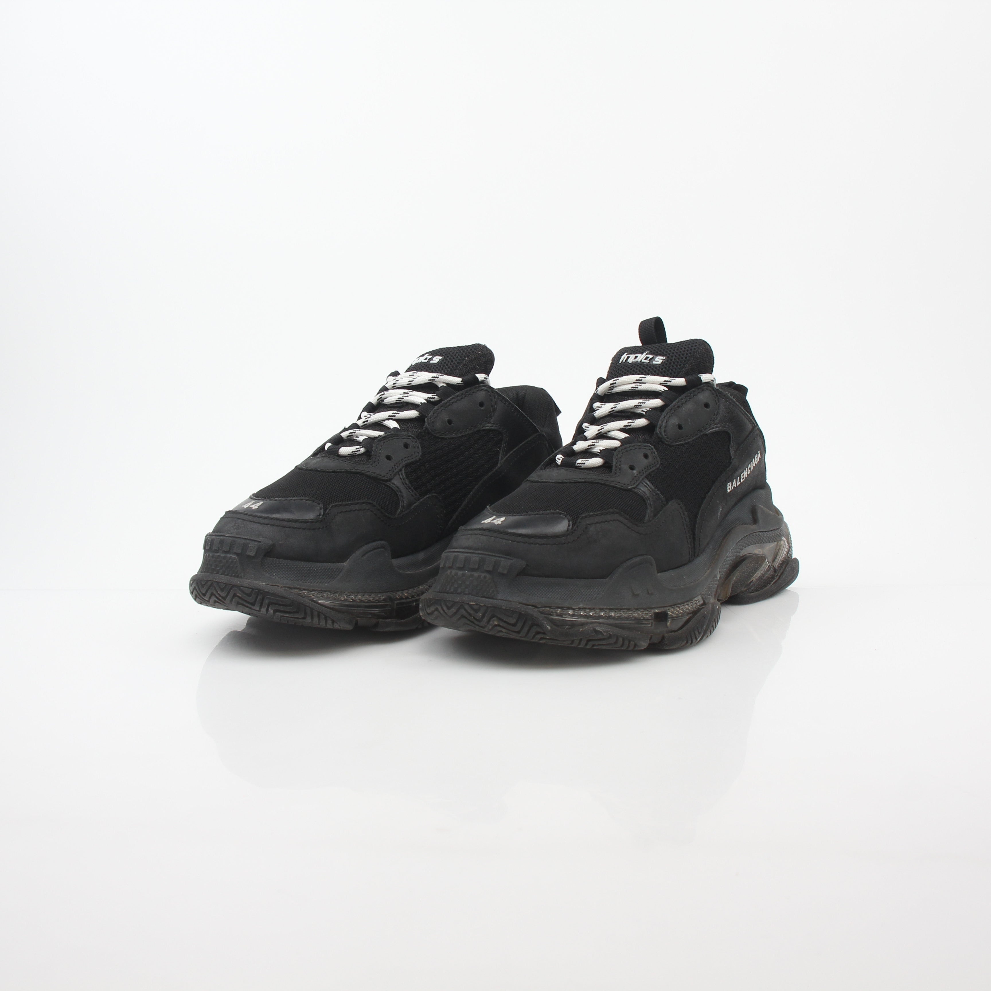 Black Balenciaga Triple S sneakers with clear sole, showcasing chunky design and sporty style from Gold & Beyond.