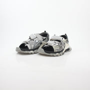 Grey Balenciaga track sandals with sporty design and thick soles, photographed from a side angle.