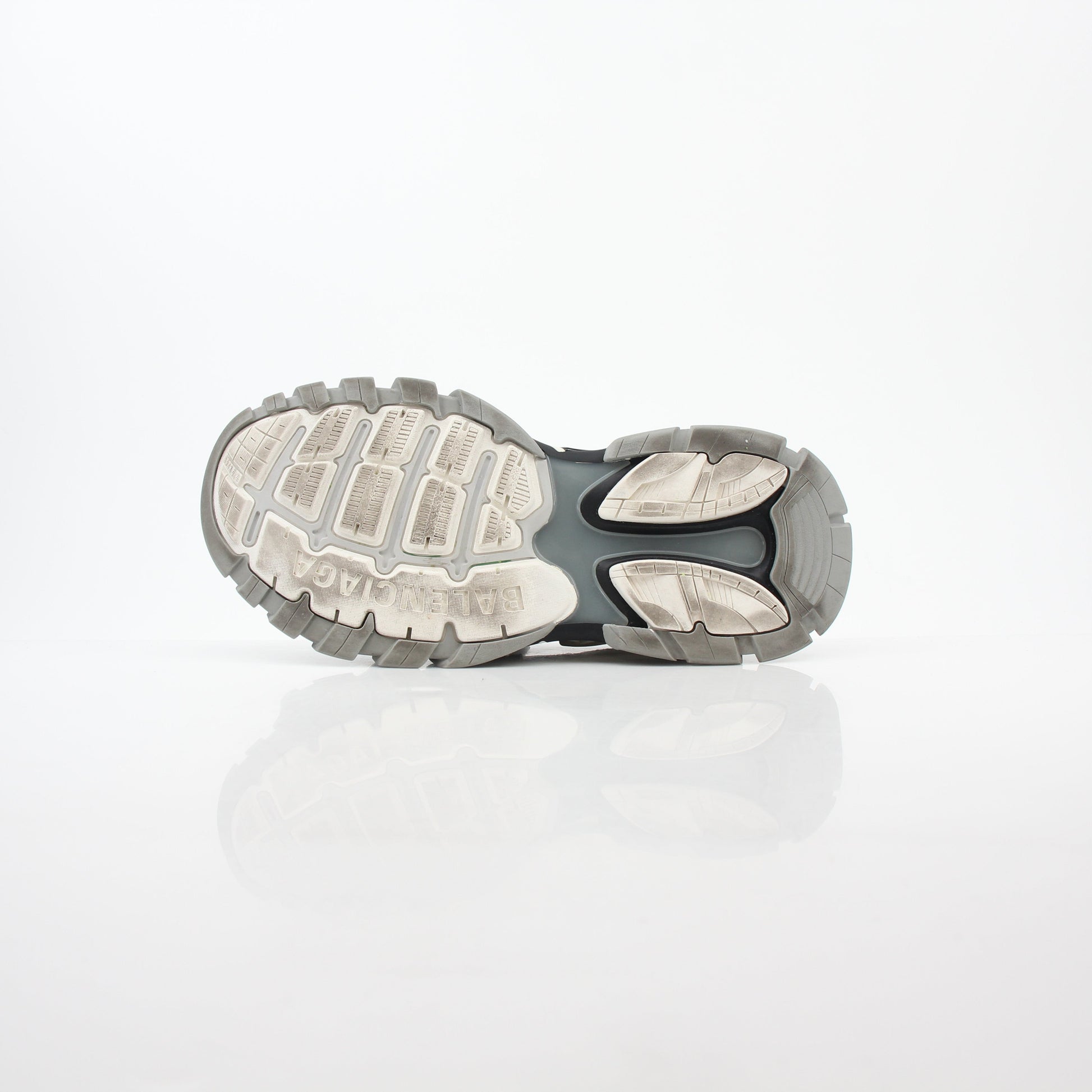 Grey Balenciaga track sandals by Gold & Beyond featuring sporty design and chunky sole, shown on a clean background.